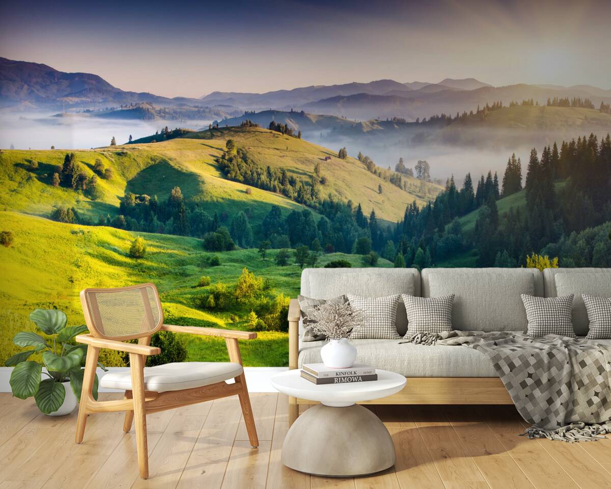 Fotobehang bergweiden komen tot leven in de warme stralen van de dageraad