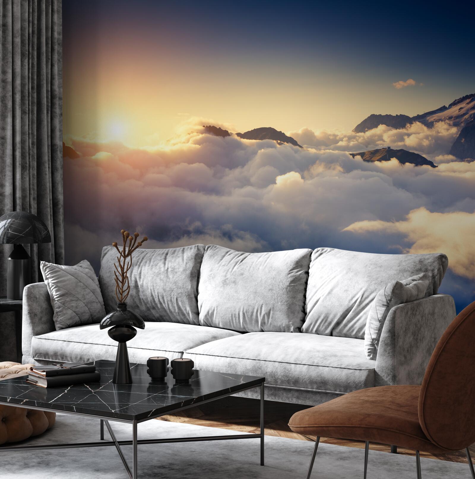 Fotobehang wolken aan de horizon absorberen de ondergaande zon