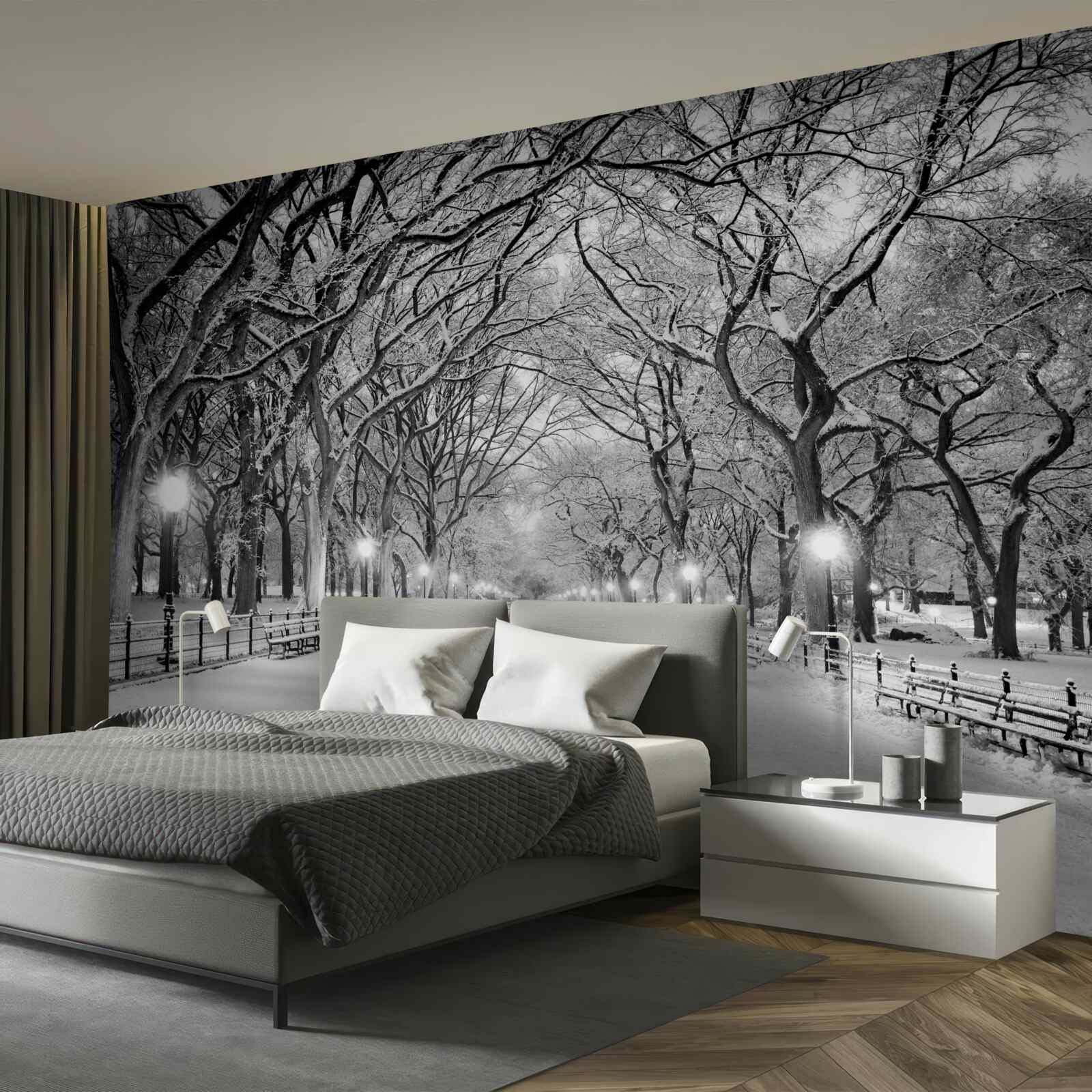 Fotobehang Besneeuwd pad tussen de bomen