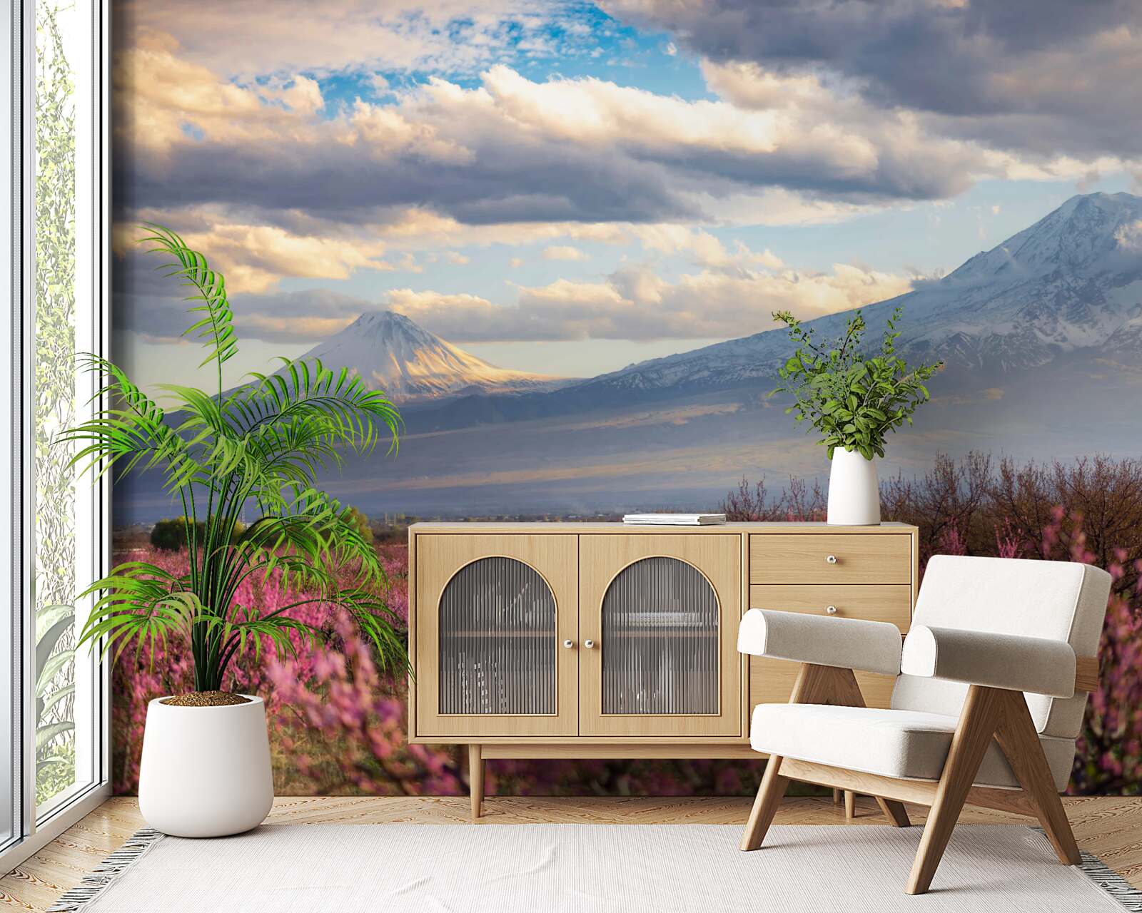 Fotobehang Aan de voet van de bergen staan de kersenbomen trots in bloei