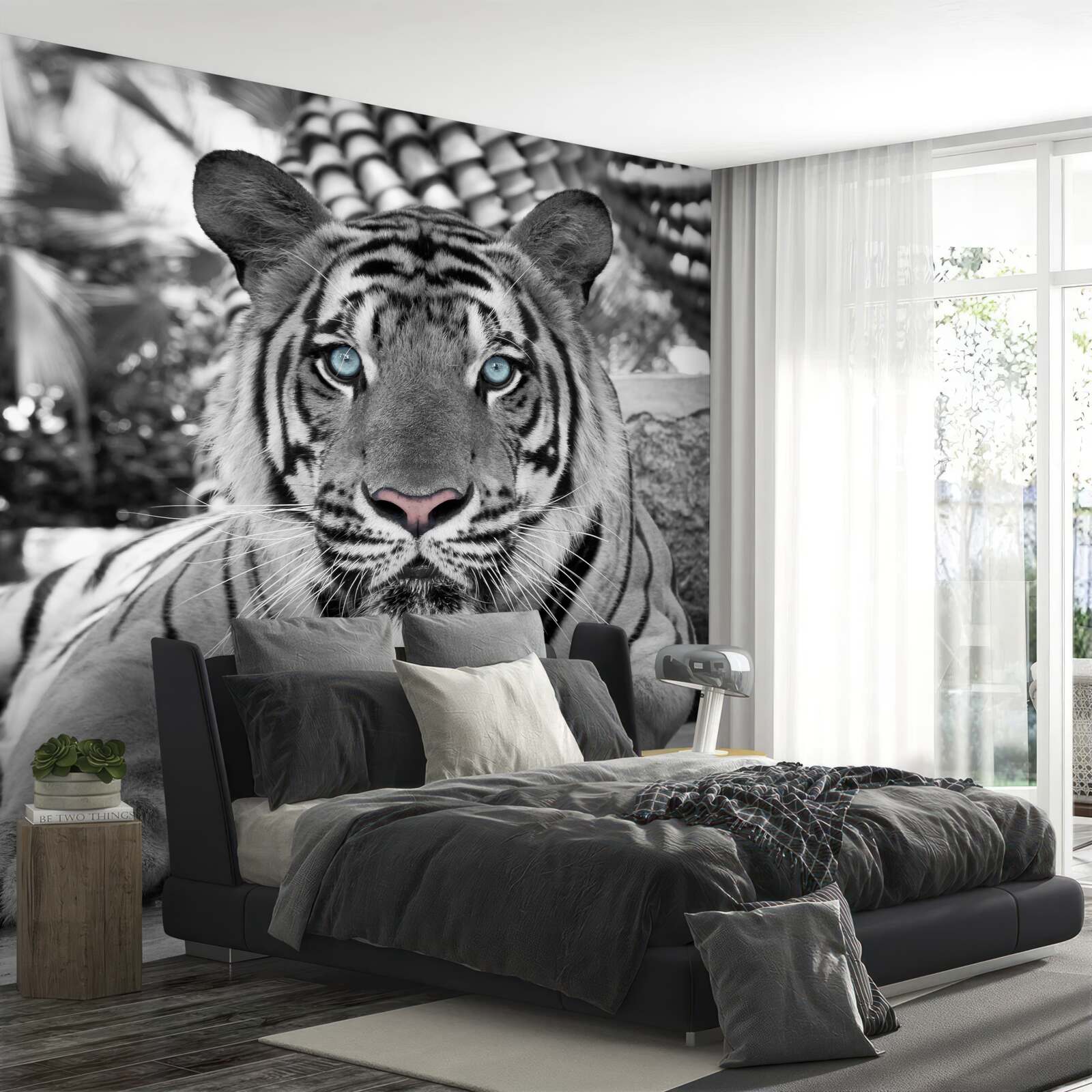 Fotobehang zwart-witte tijger met prachtige blauwe ogen