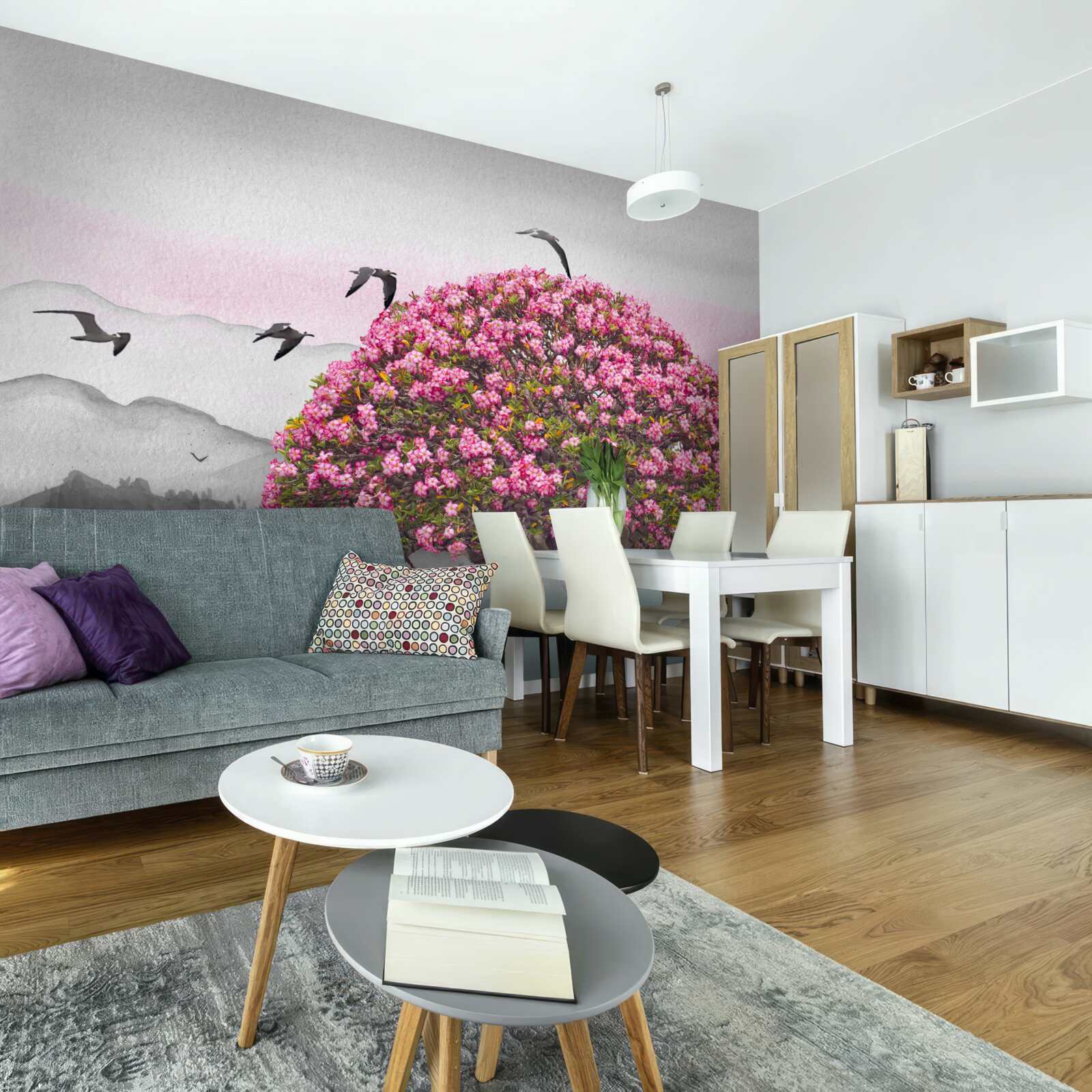 Fotobehang vogels vliegen over een bloeiende boom