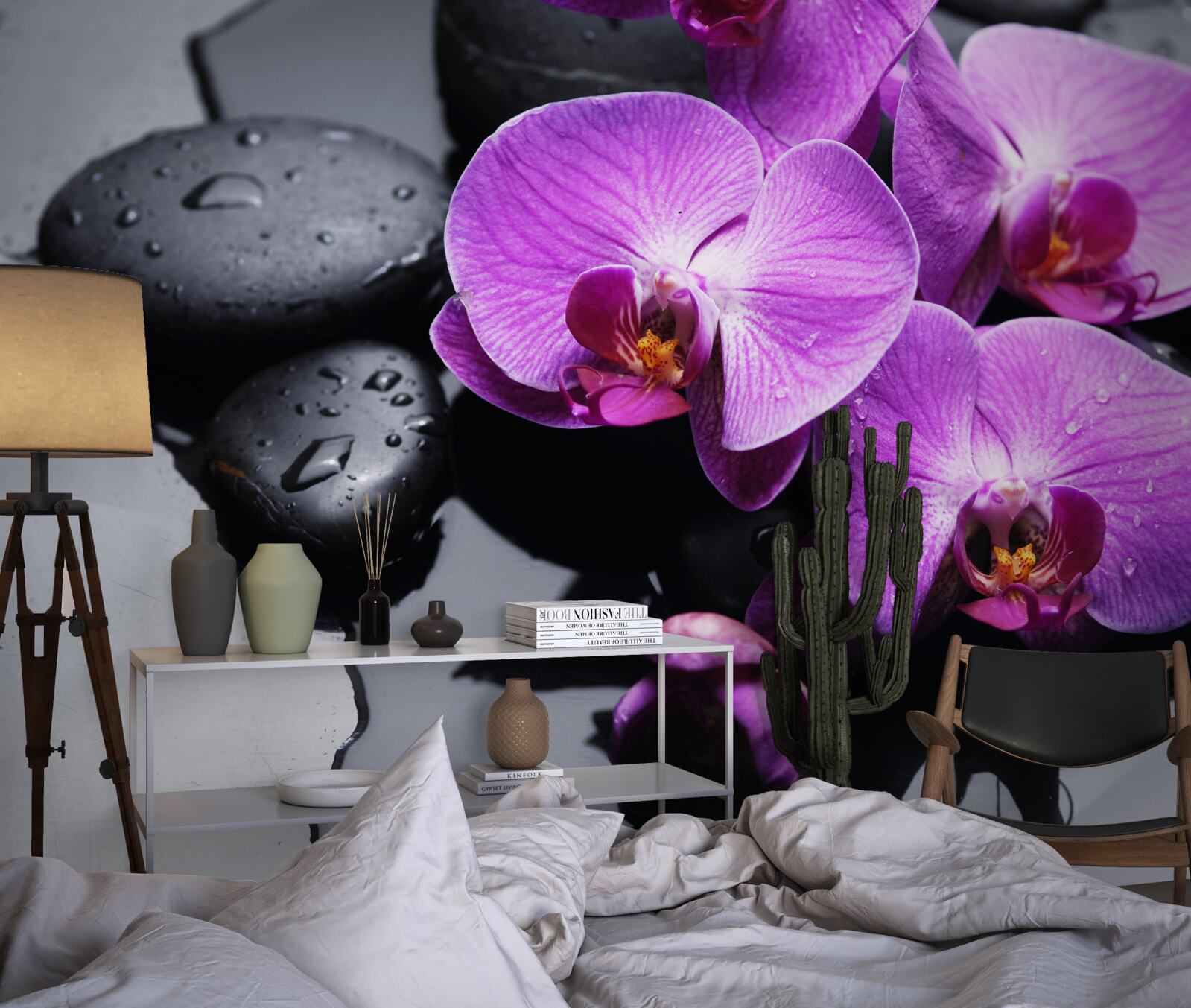 Fotobehang paarse orchidee omringd door water en stenen