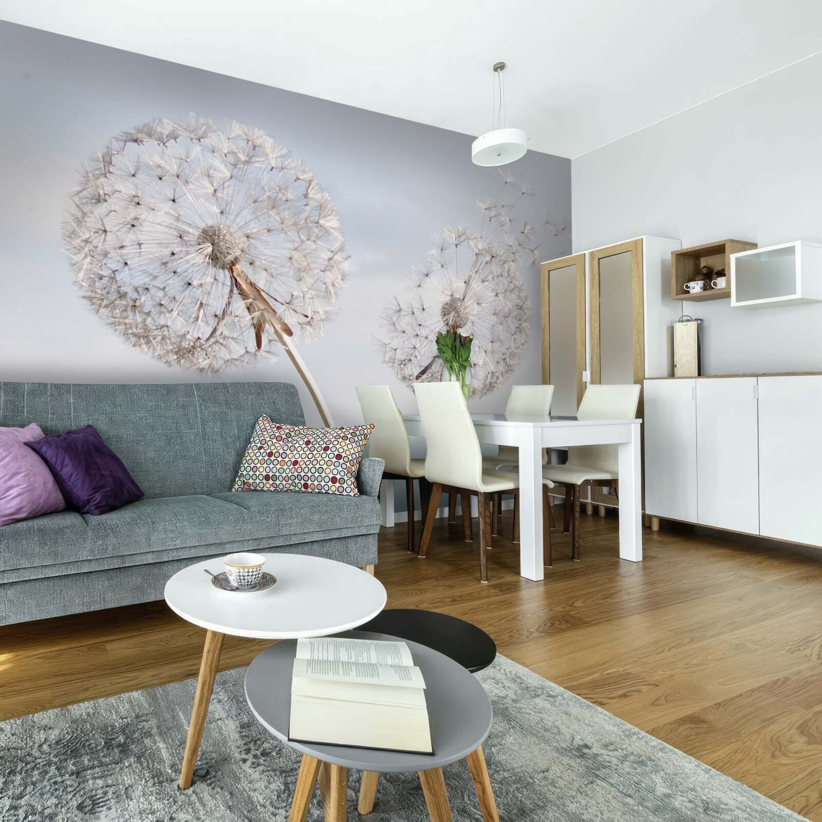 Fotobehang de wind blaast de paardenbloemen weg