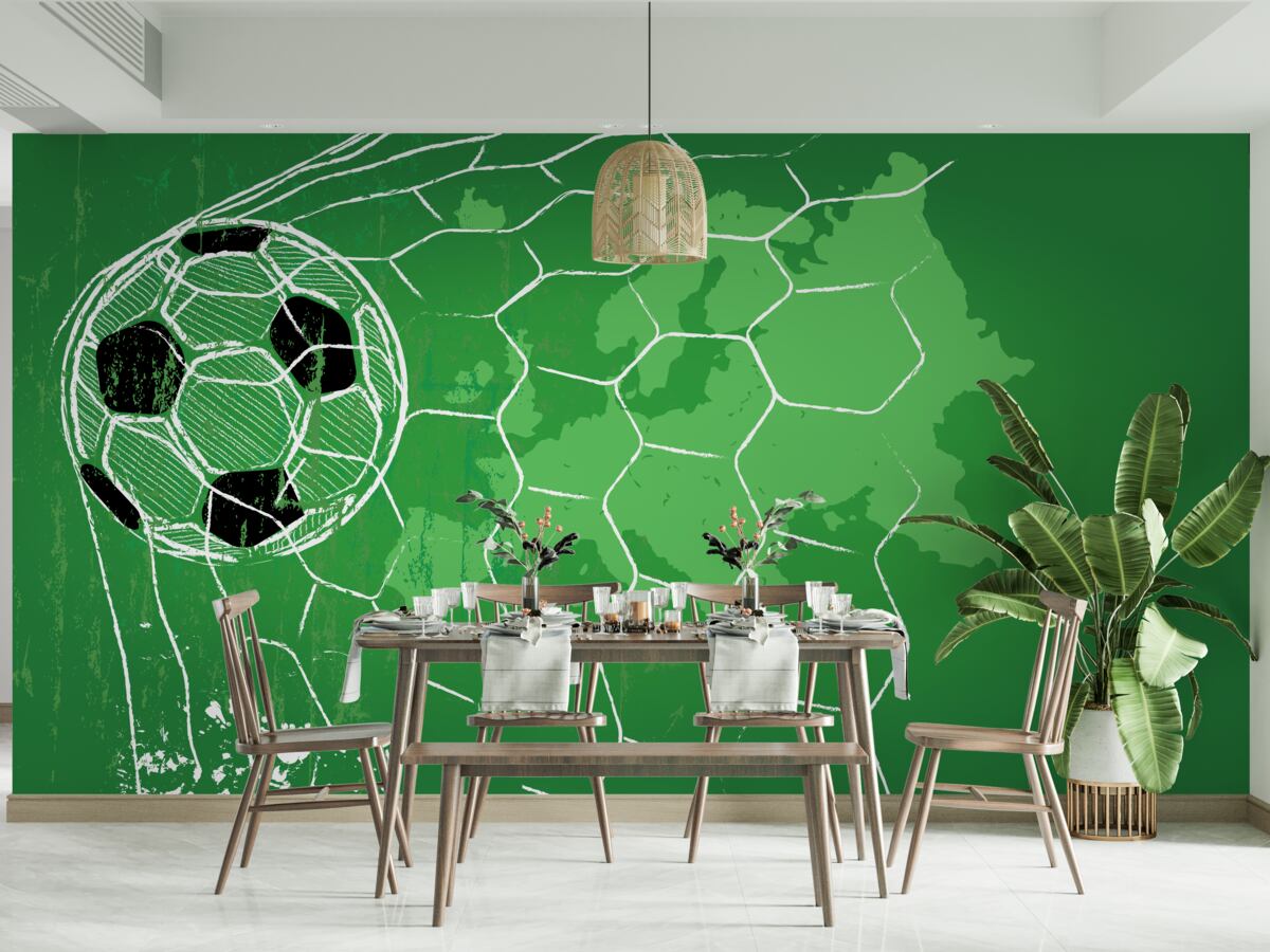 Fotobehang contour van een voetbal en een net tegen een groene achtergrond