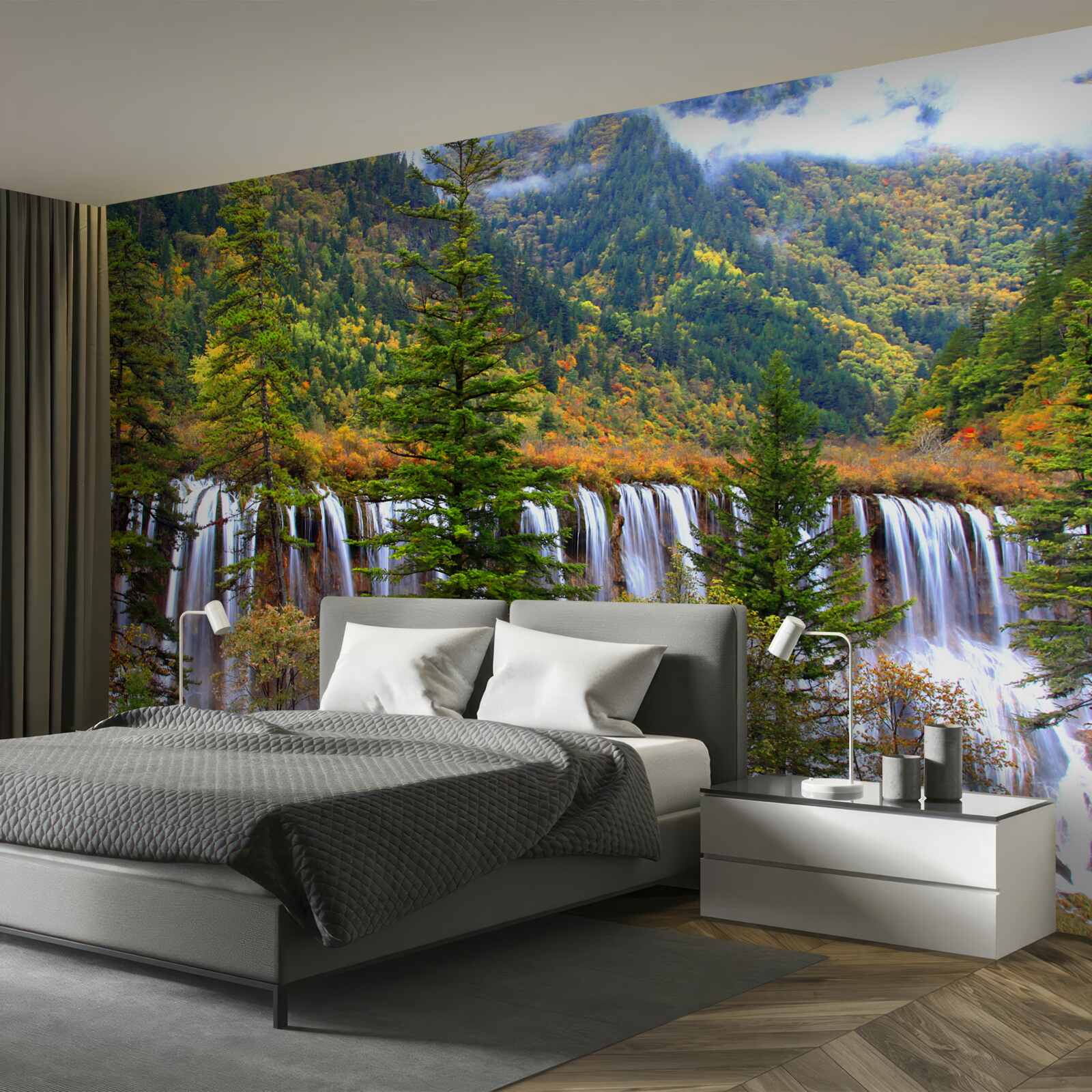 Fotobehang een enorme waterval die langs de berghelling naar beneden stroomt