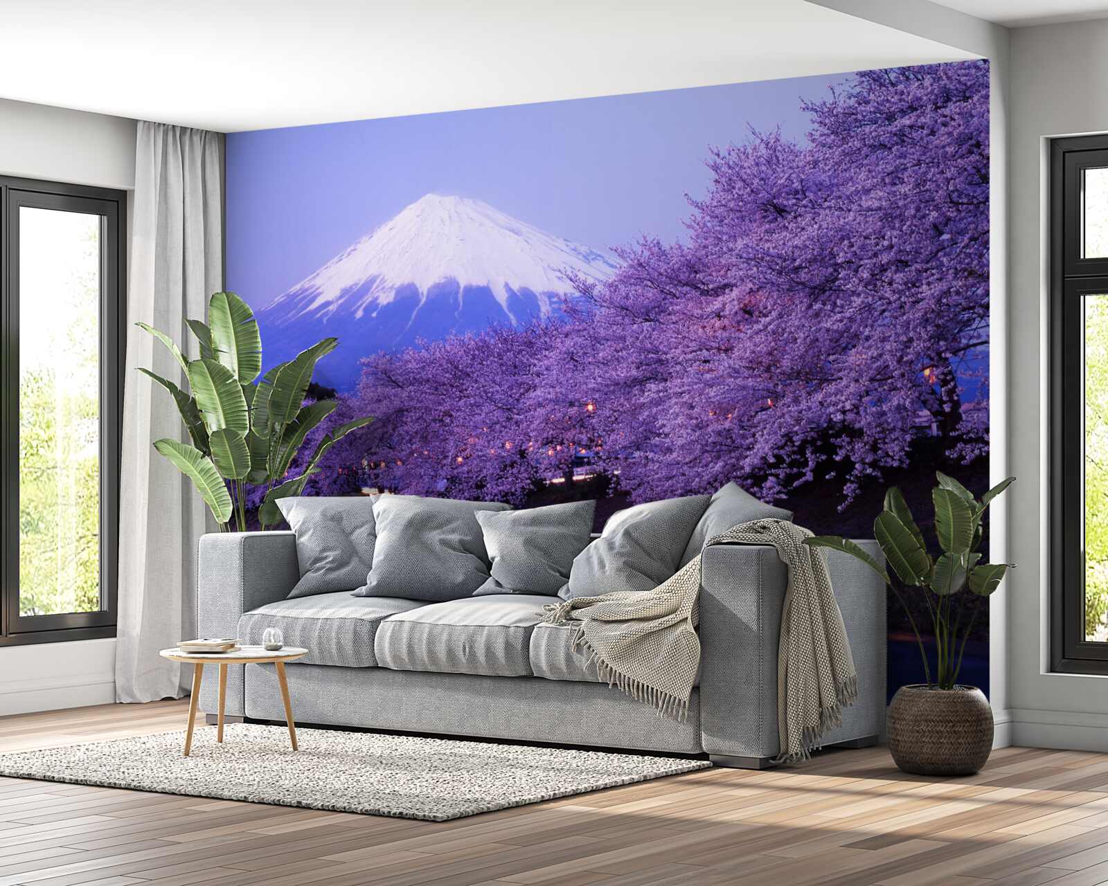 Fotobehang seringbloemen aan de voet van de berg groeien dicht bij het water