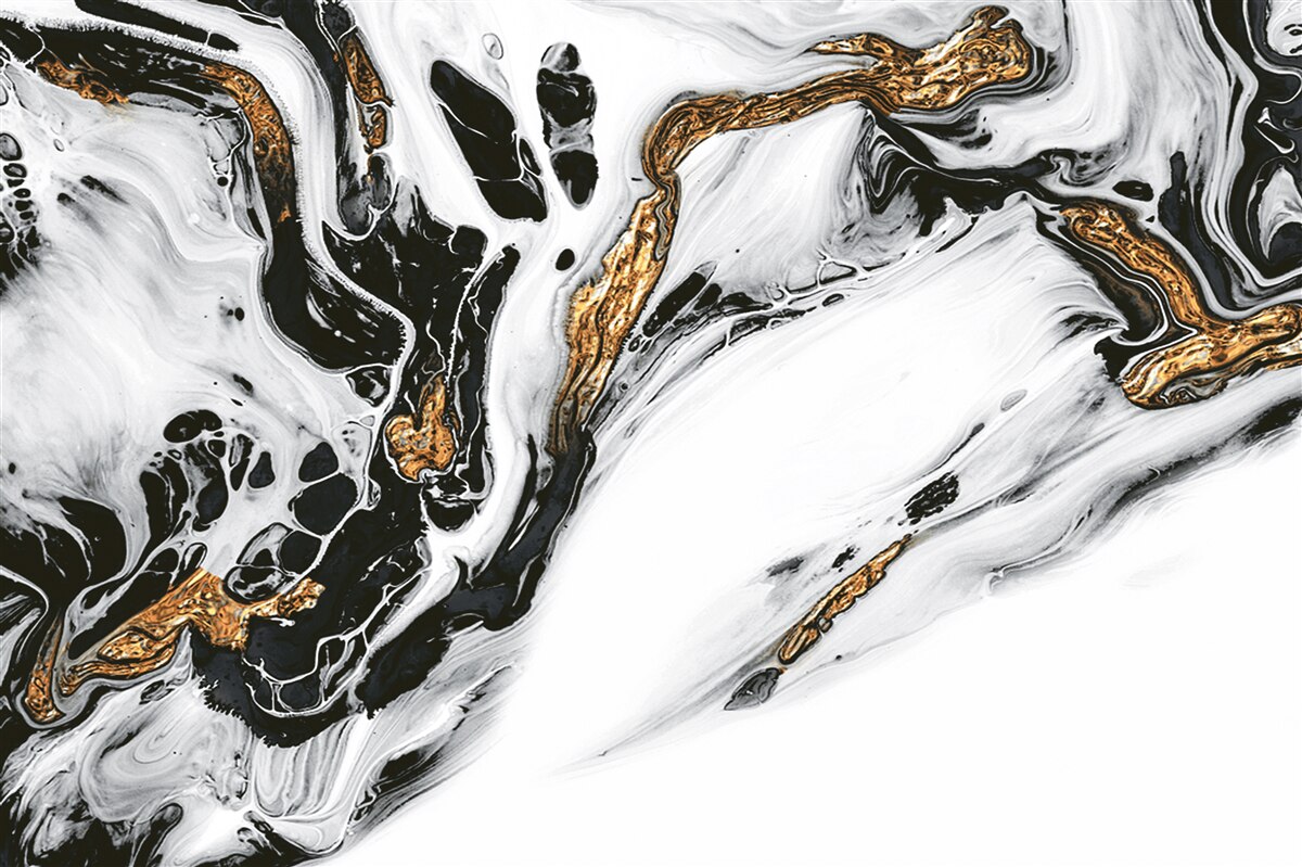 Fotobehang hellingen bedekt met sneeuw, met stenen in gouden licht