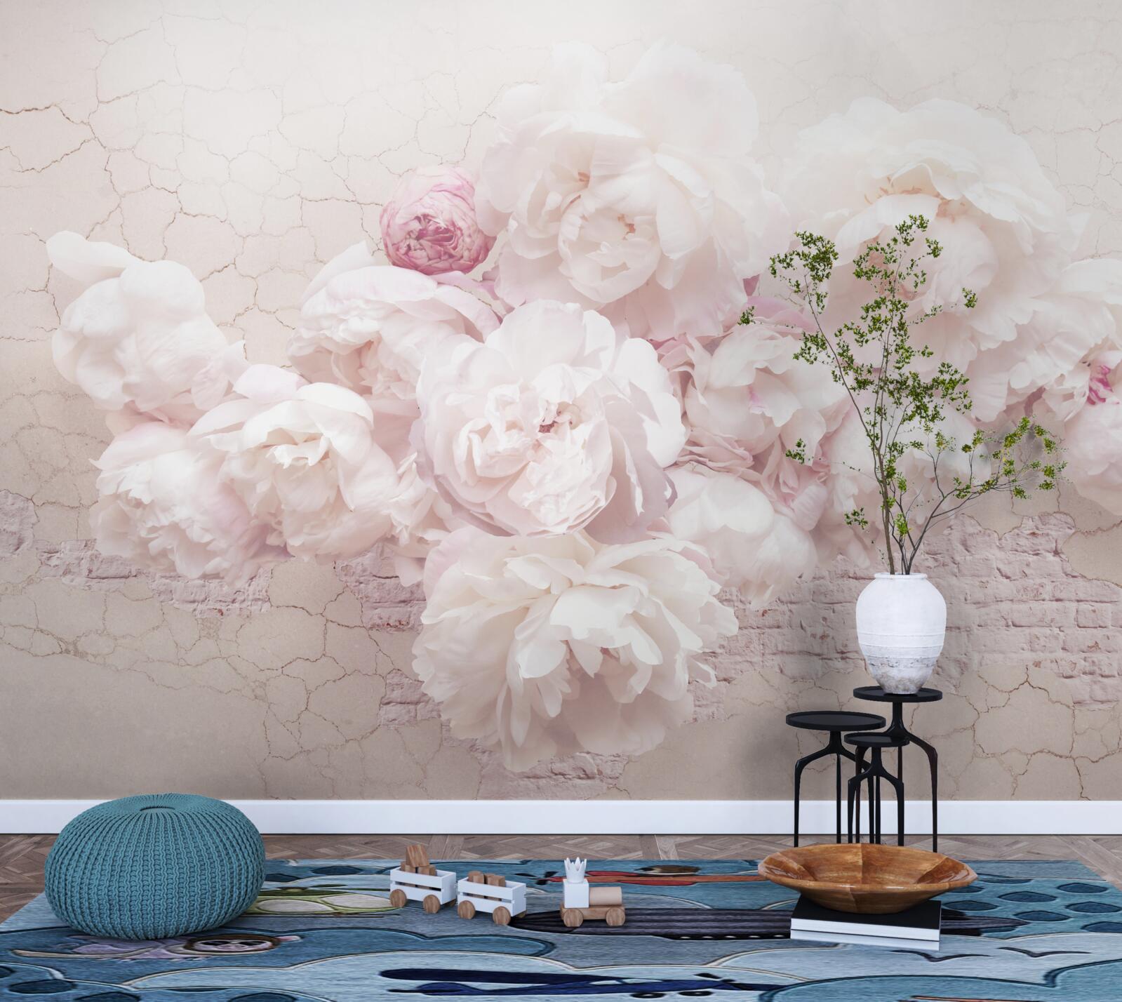 Fotobehang weelderige boetieks met bloemen op een rotsachtige achtergrond