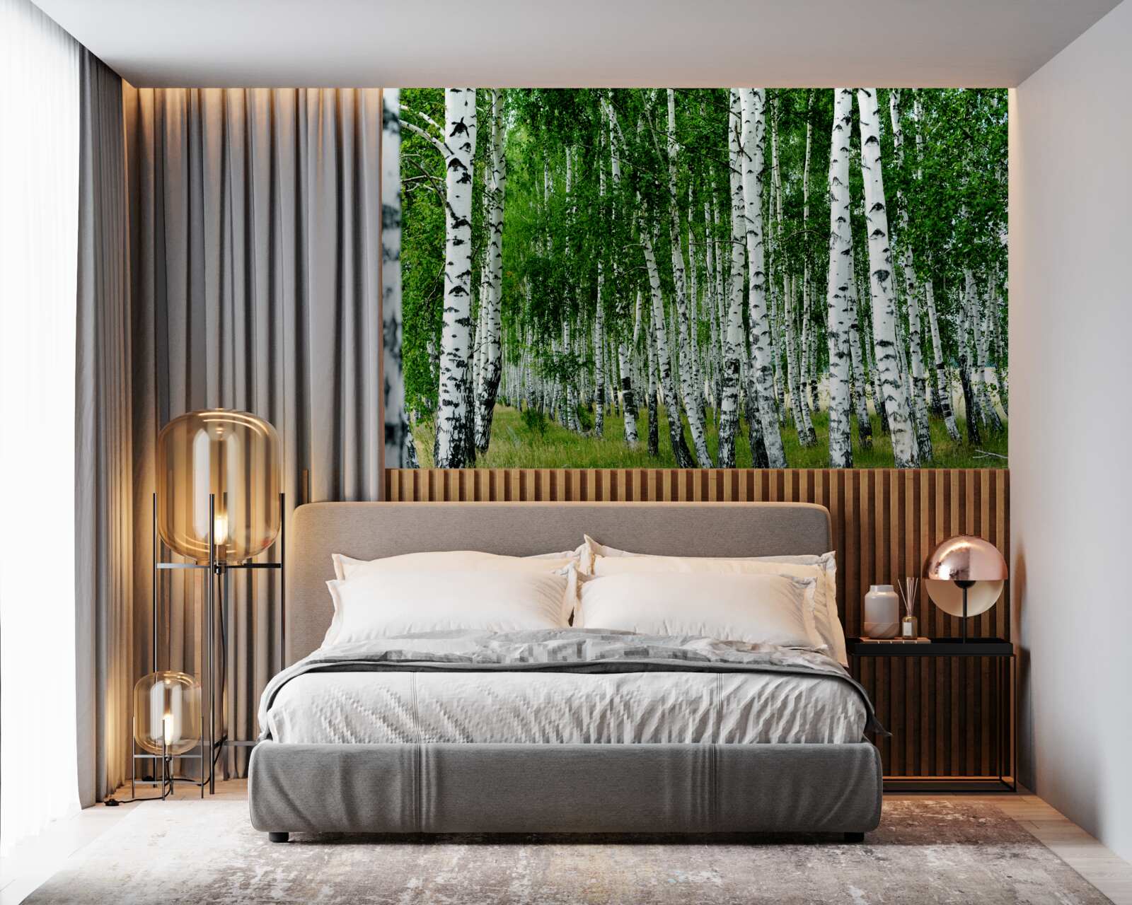 Fotobehang groene berken met sierlijke stammen in een open veld