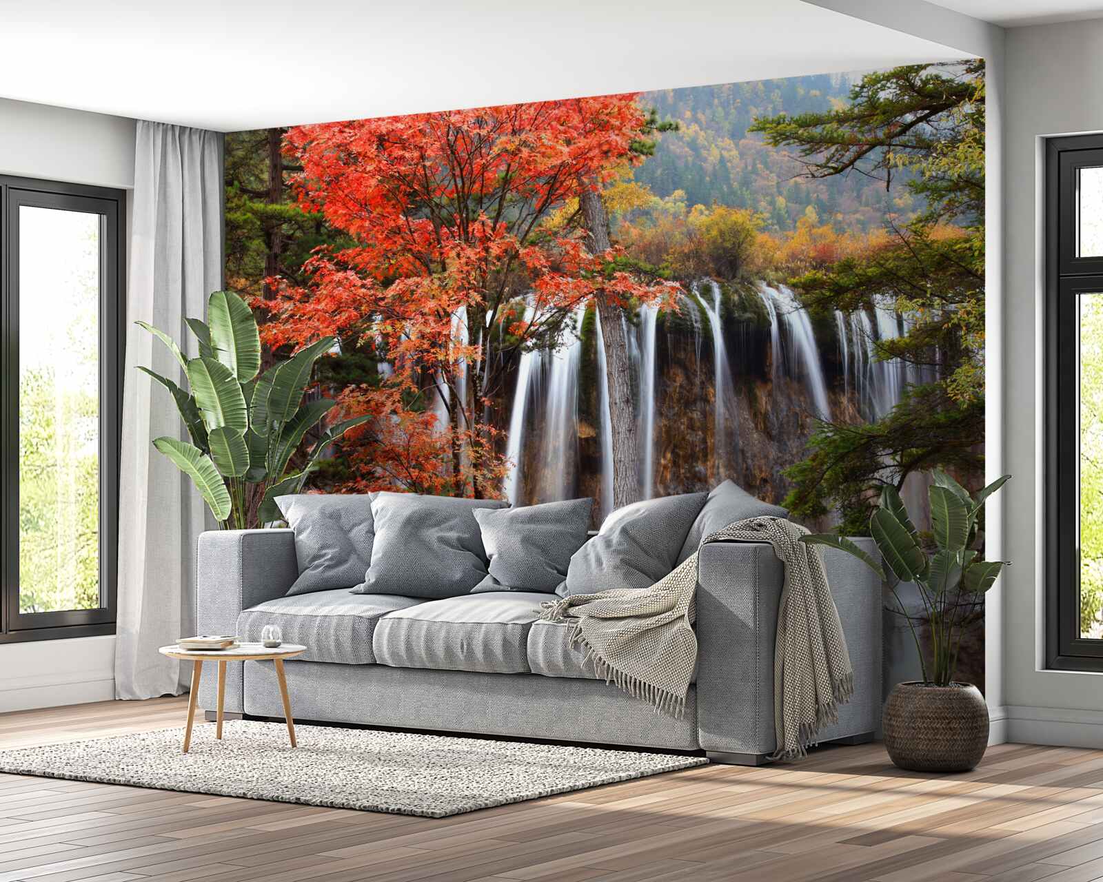 Fotobehang bos bij een krachtige waterval in de herfst