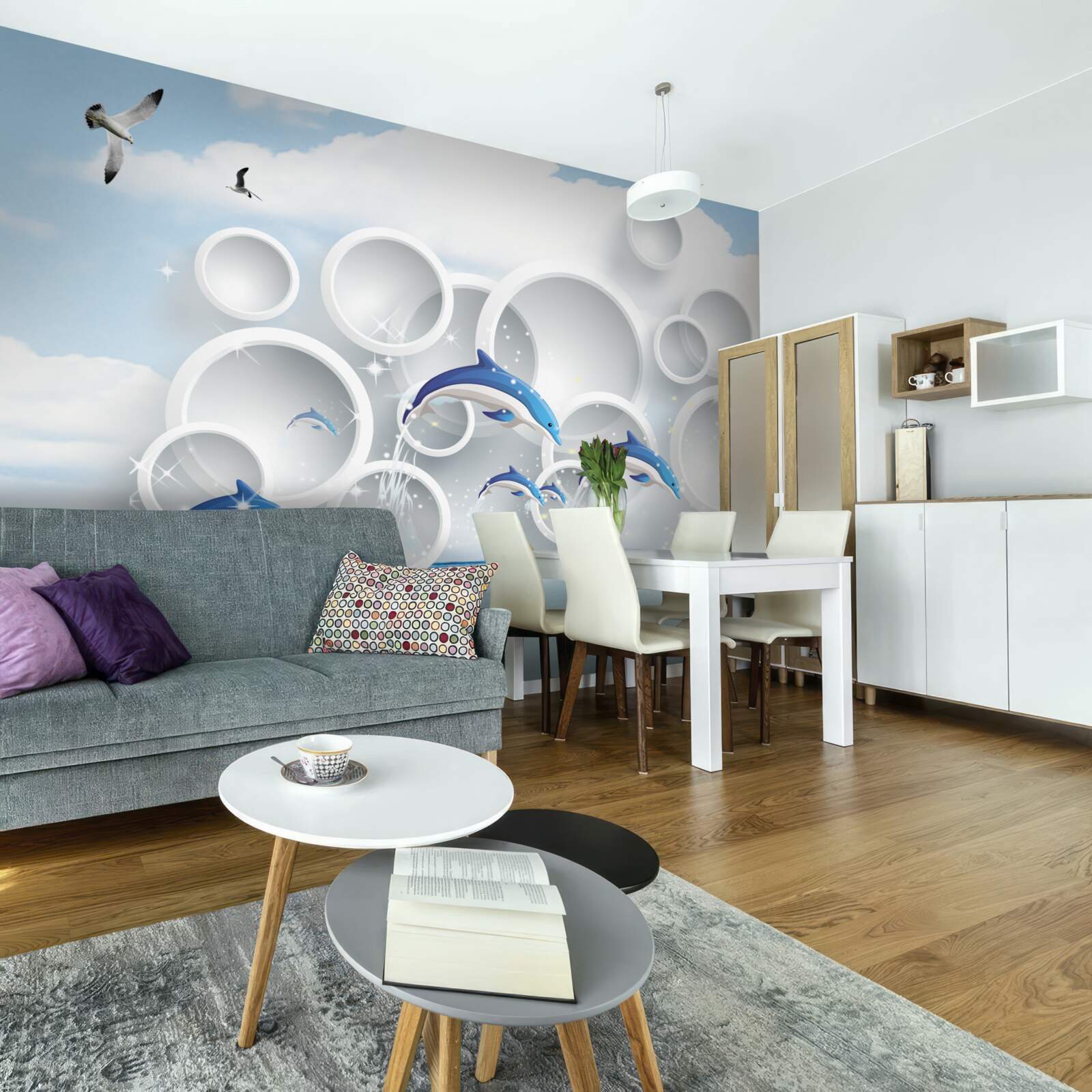 Fotobehang abstracte ringen en dolfijnen die op het wateroppervlak springen