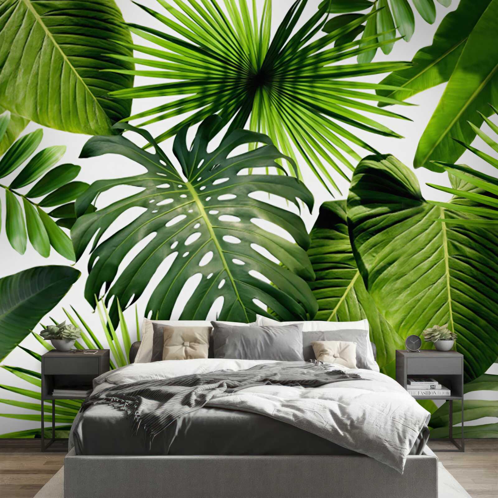 Fotobehang grote groene bladeren van tropische planten