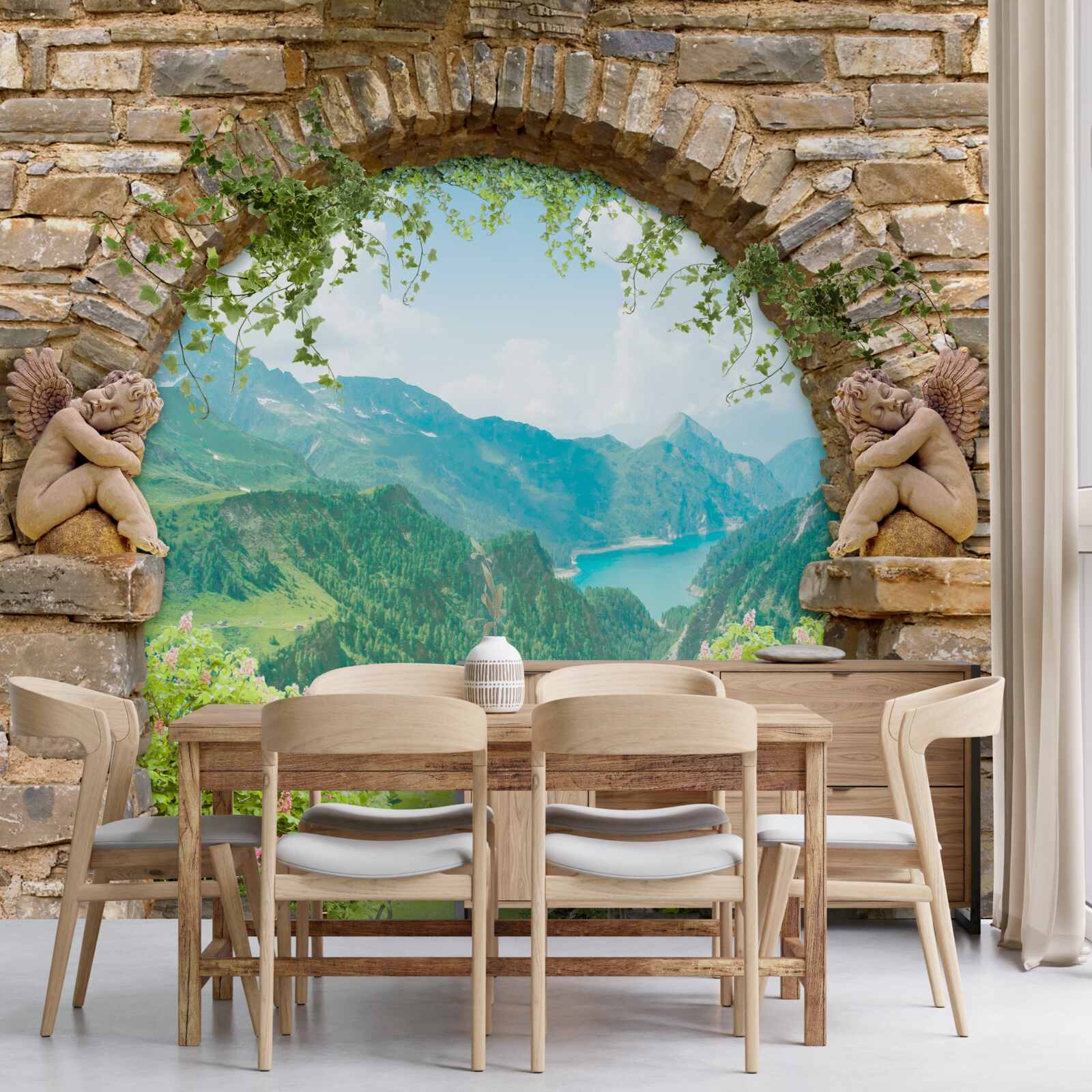 Fotobehang oude stenen boog met beeld van engelen en panorama van bergen