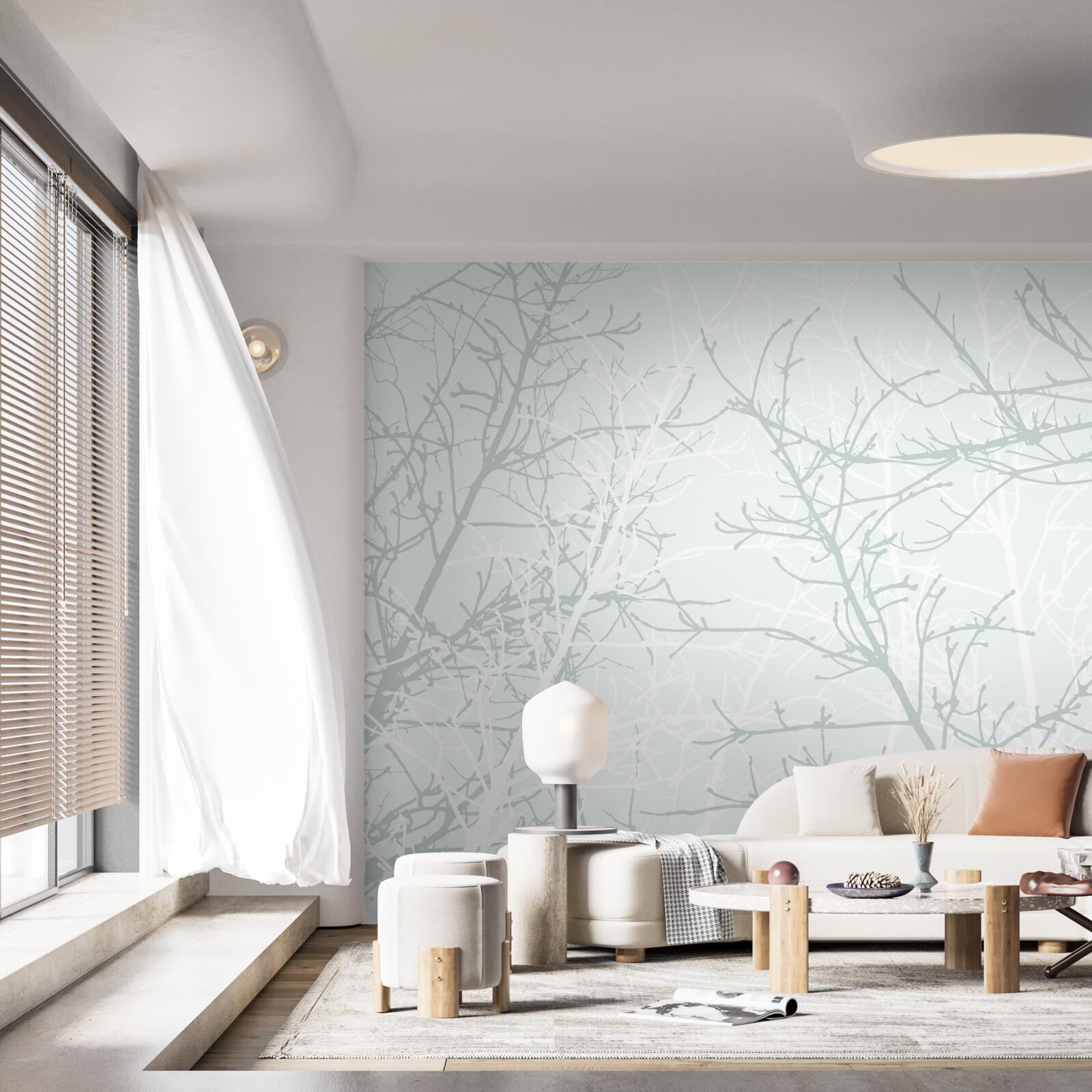 Fotobehang dunne boomtakken in de herfst