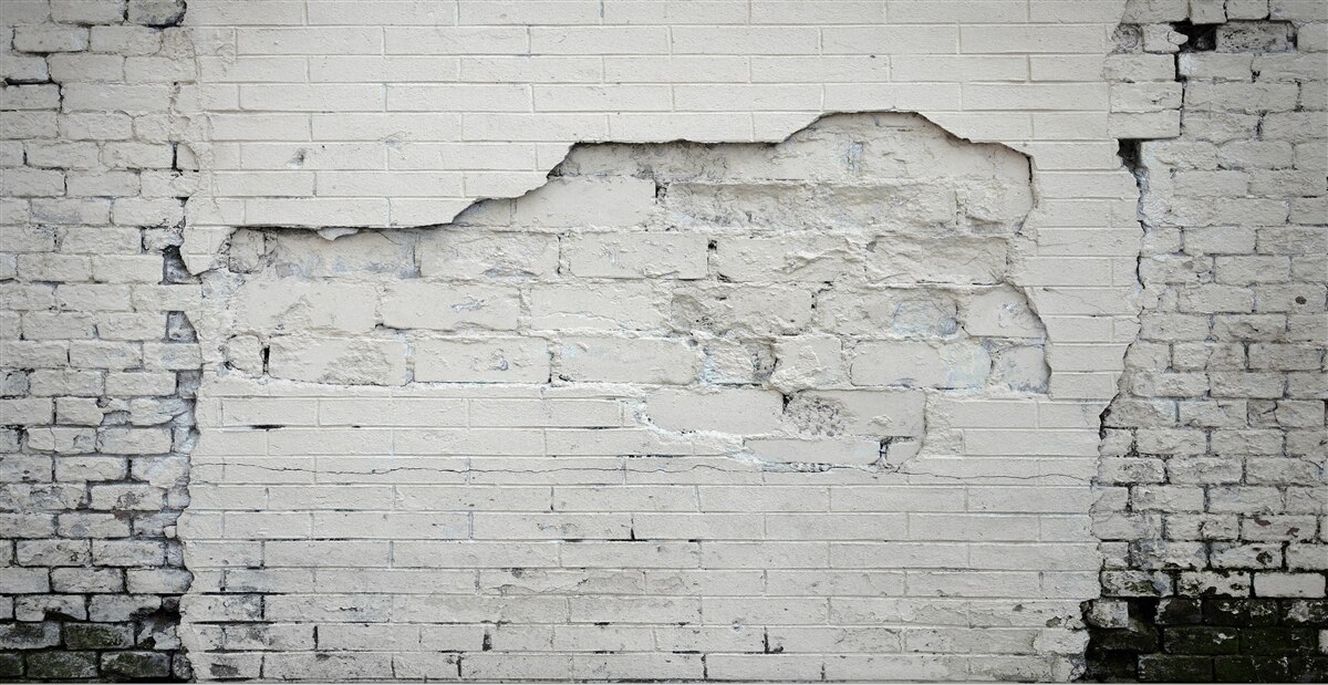 Fotobehang grijze stenen en bakstenen muur