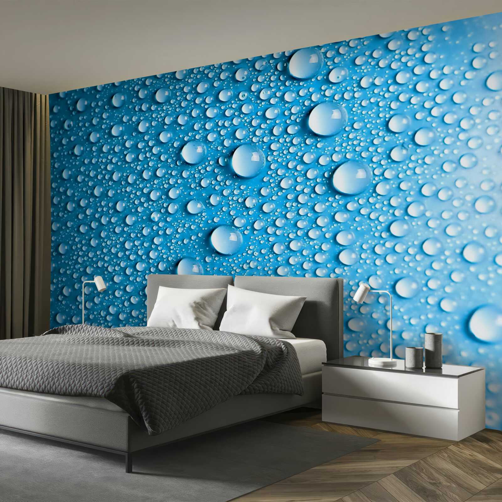 Fotobehang grote druppels op een blauwe achtergrond