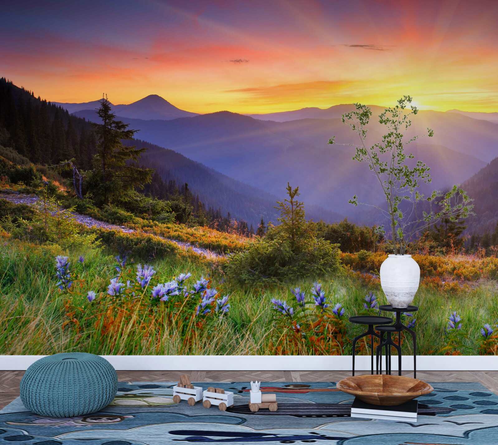 Fotobehang de zon gaat onder boven een alpenweide