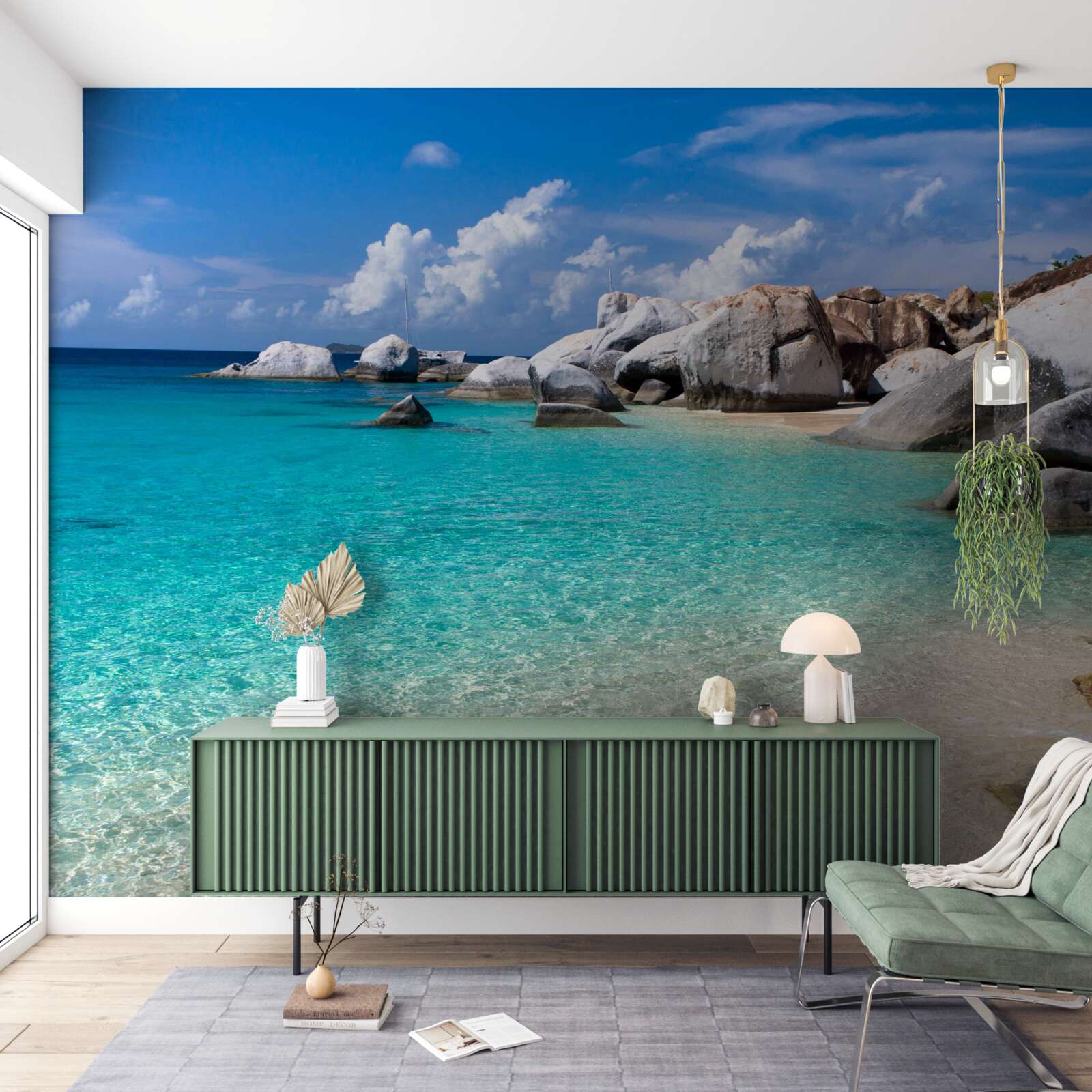 Fotobehang azuurblauw oceaanwater en een zandkust