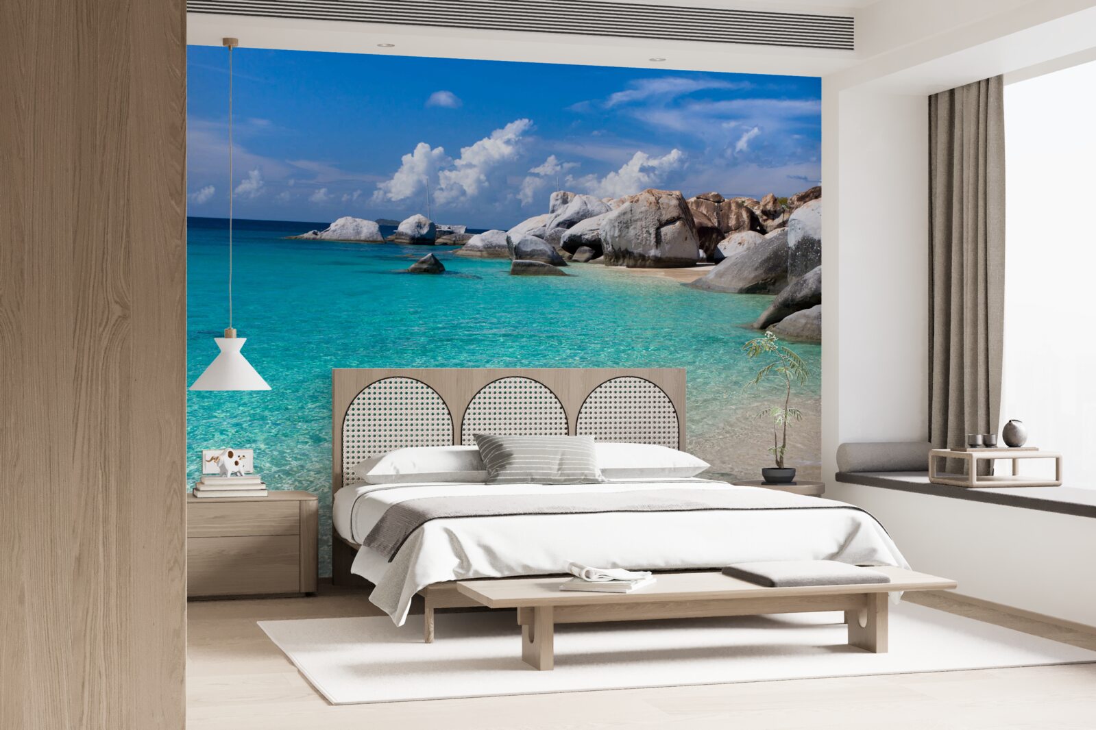 Fotobehang azuurblauw oceaanwater en een zandkust