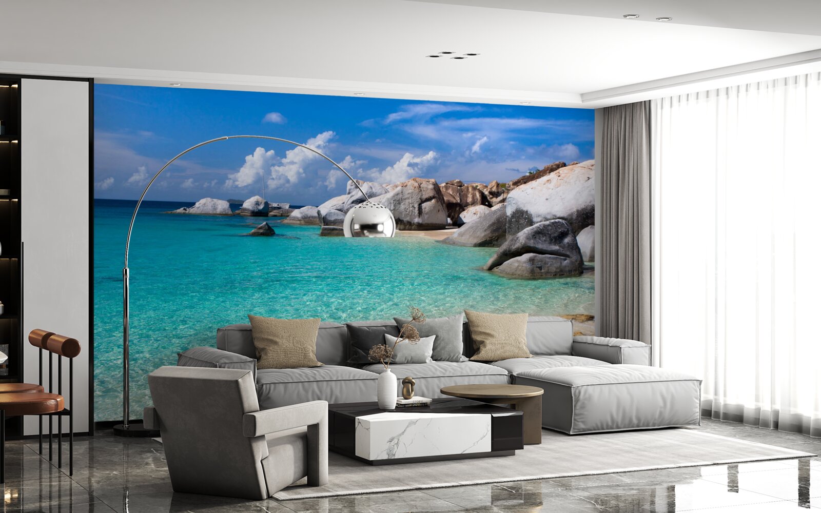 Fotobehang azuurblauw oceaanwater en een zandkust