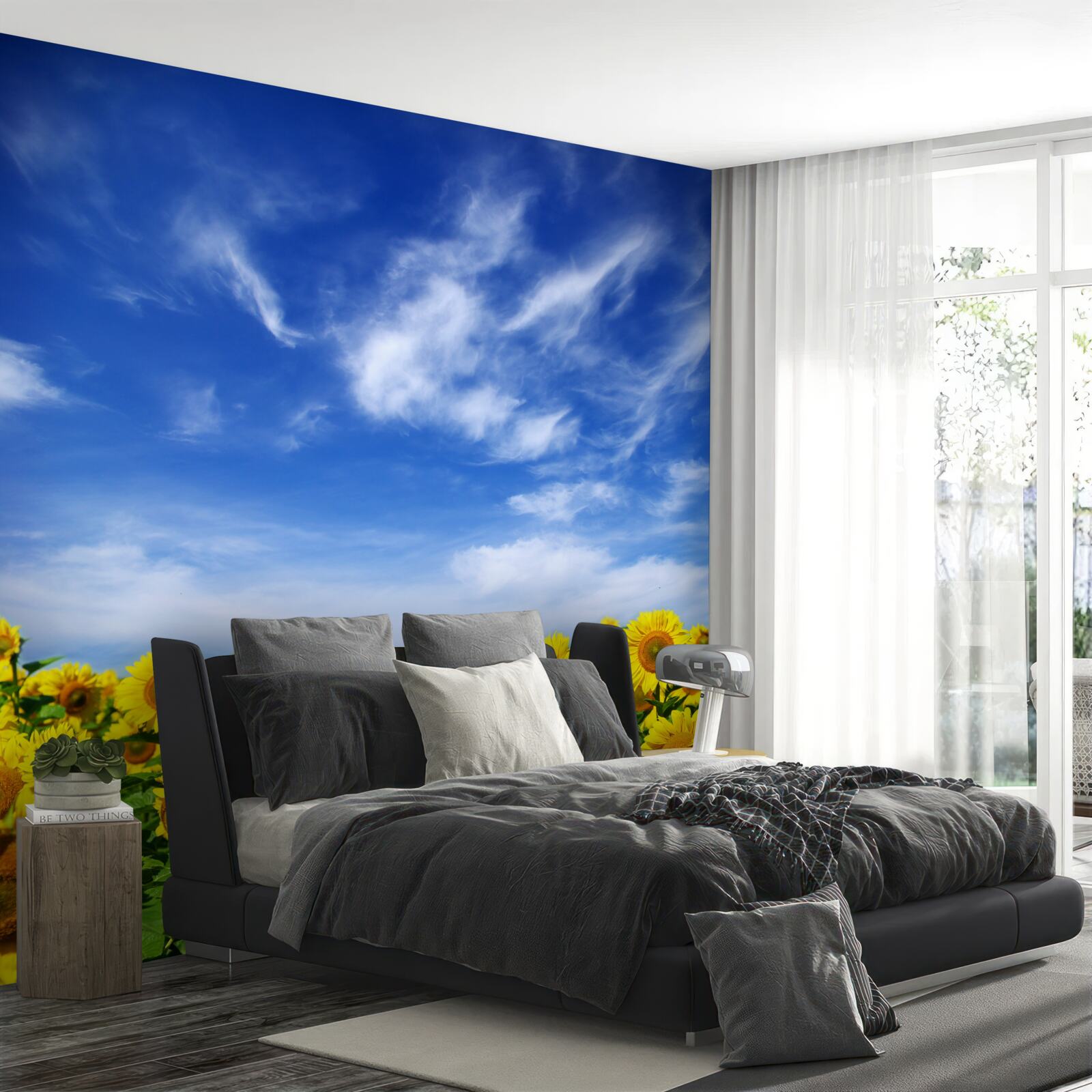 Fotobehang zonnebloemen steken duidelijk af tegen de blauwe lucht