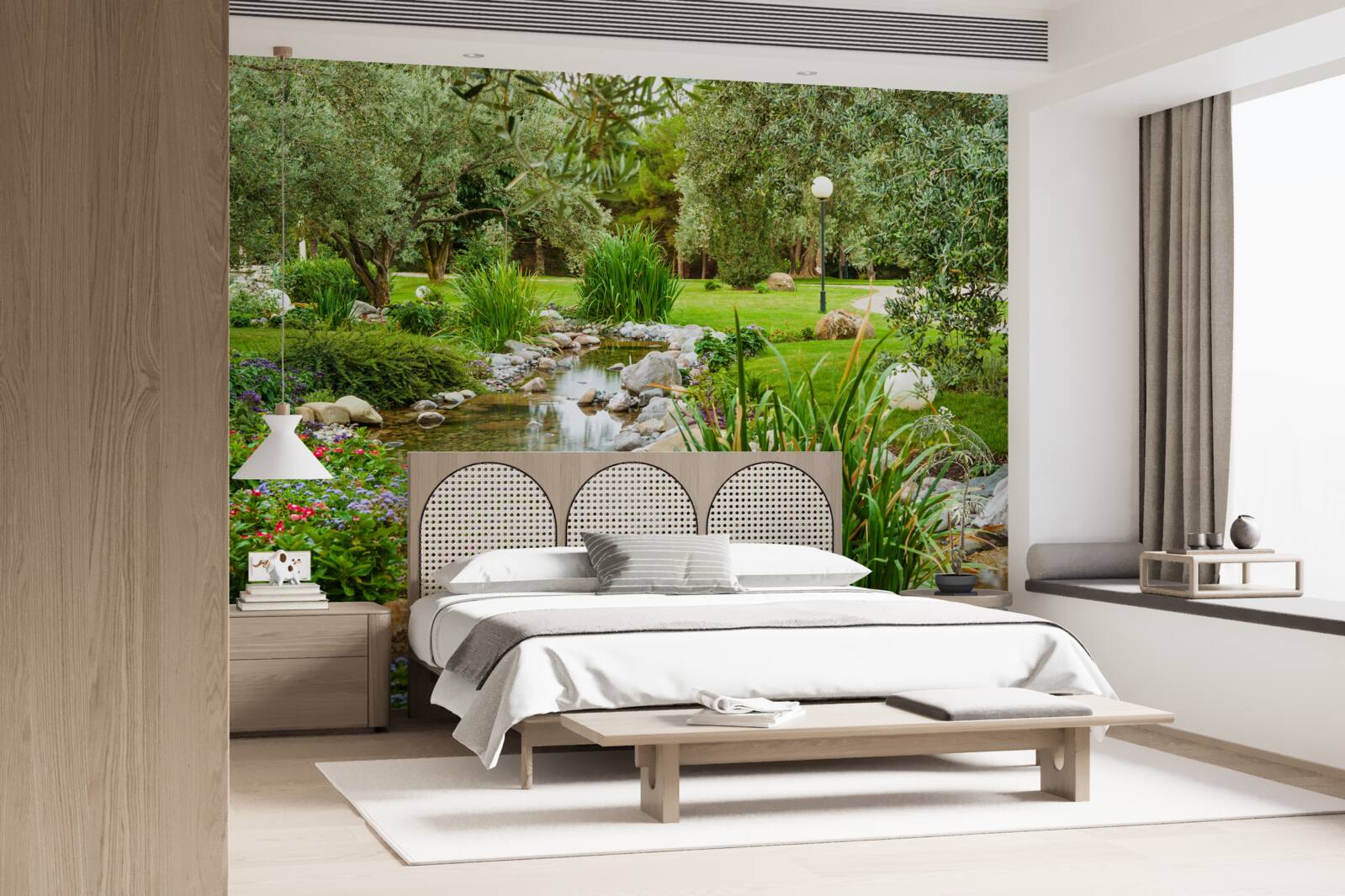 Fotobehang een beek die door een groene weide stroomt