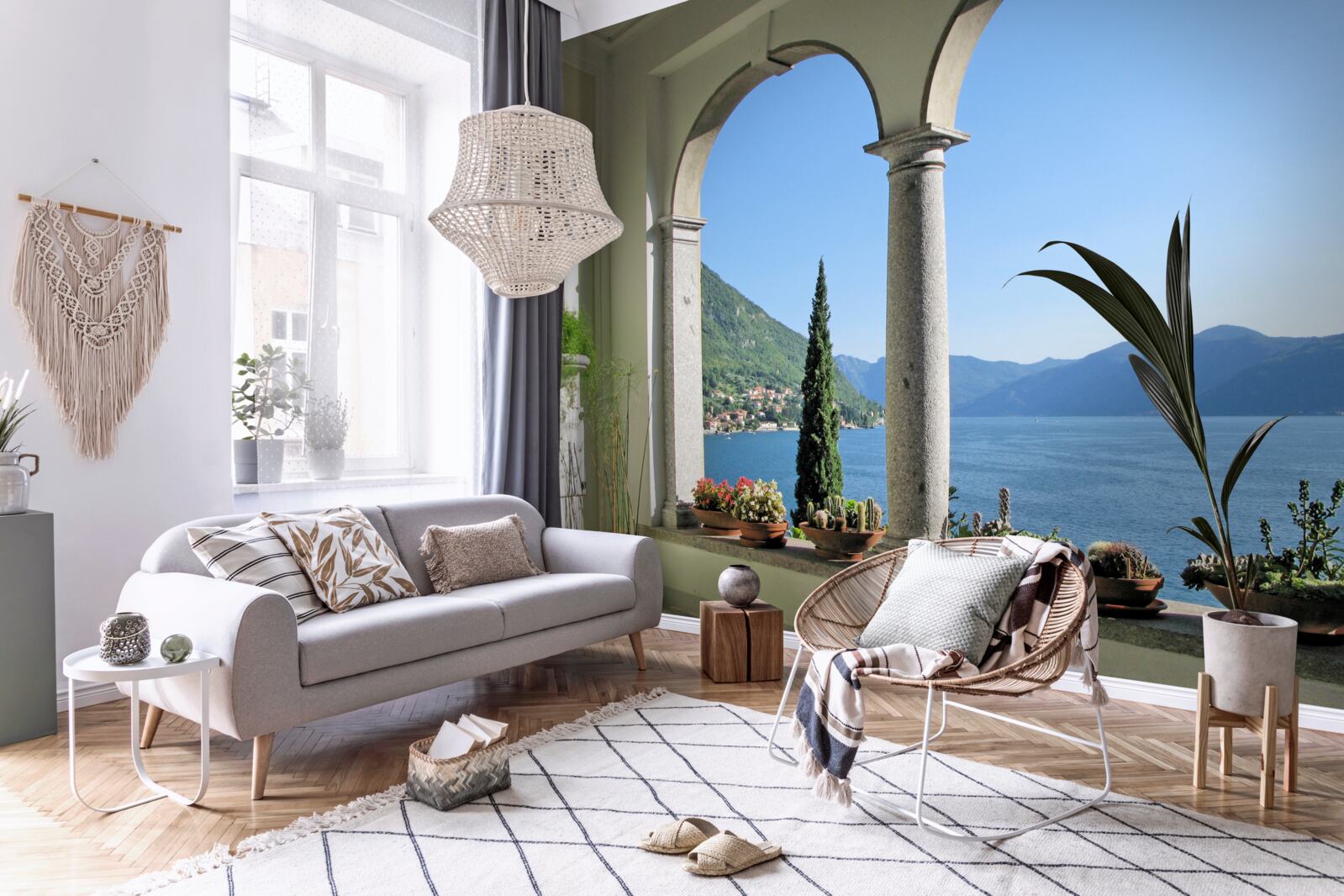 Fotobehang balkon met boogopeningen en uitzicht op water en bergen