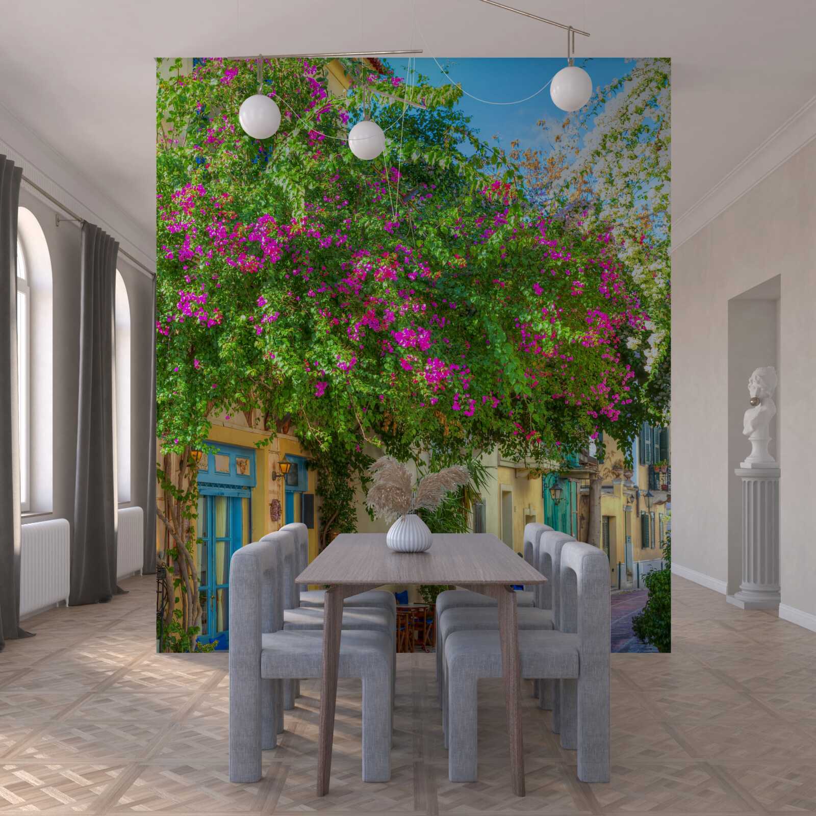 Fotobehang dicht groen boven de huizen