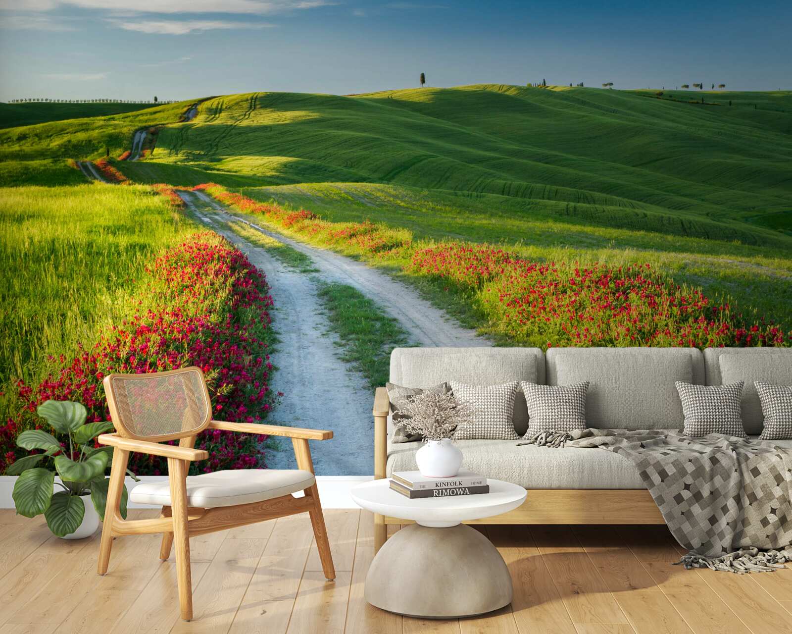 Fotobehang weg in de bergen omgeven door groene velden