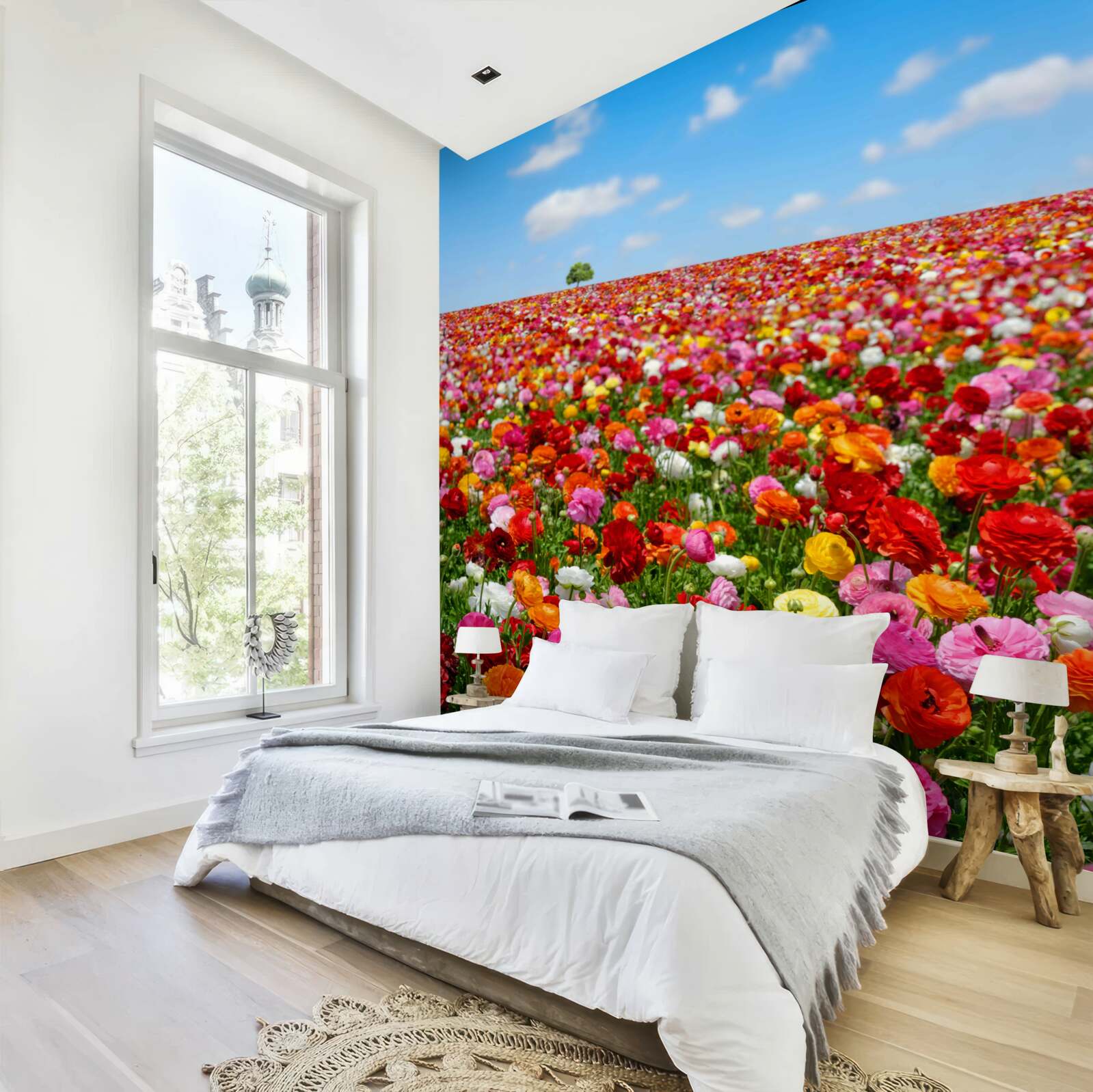 Fotobehang een weide bezaaid met een veelheid aan kleurrijke bloemen