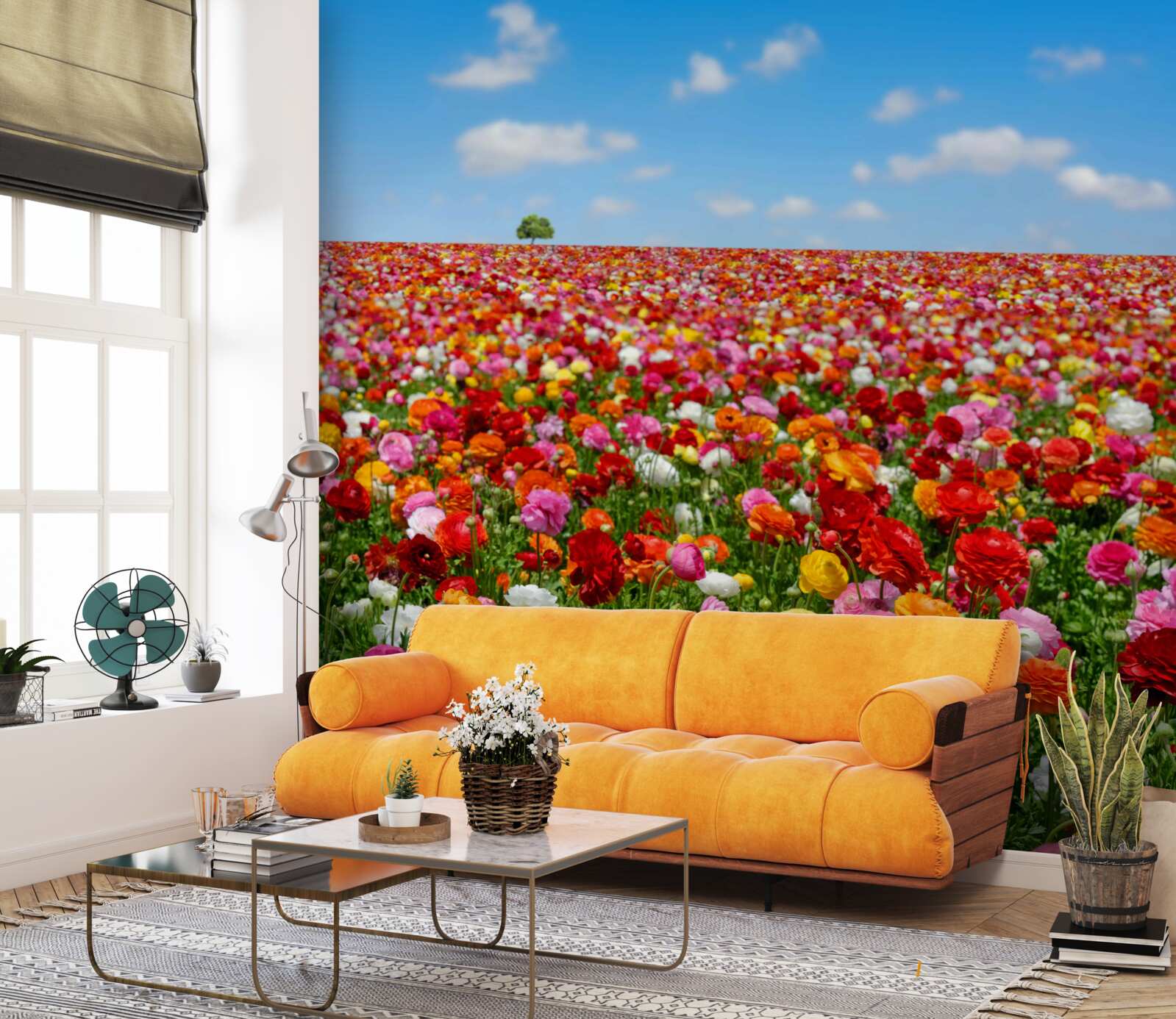 Fotobehang een weide bezaaid met een veelheid aan kleurrijke bloemen