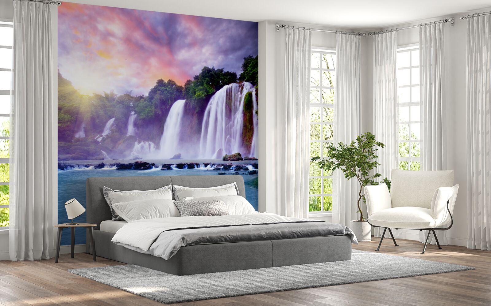 Fotobehang een enorme waterval op een achtergrond van een zonsondergang
