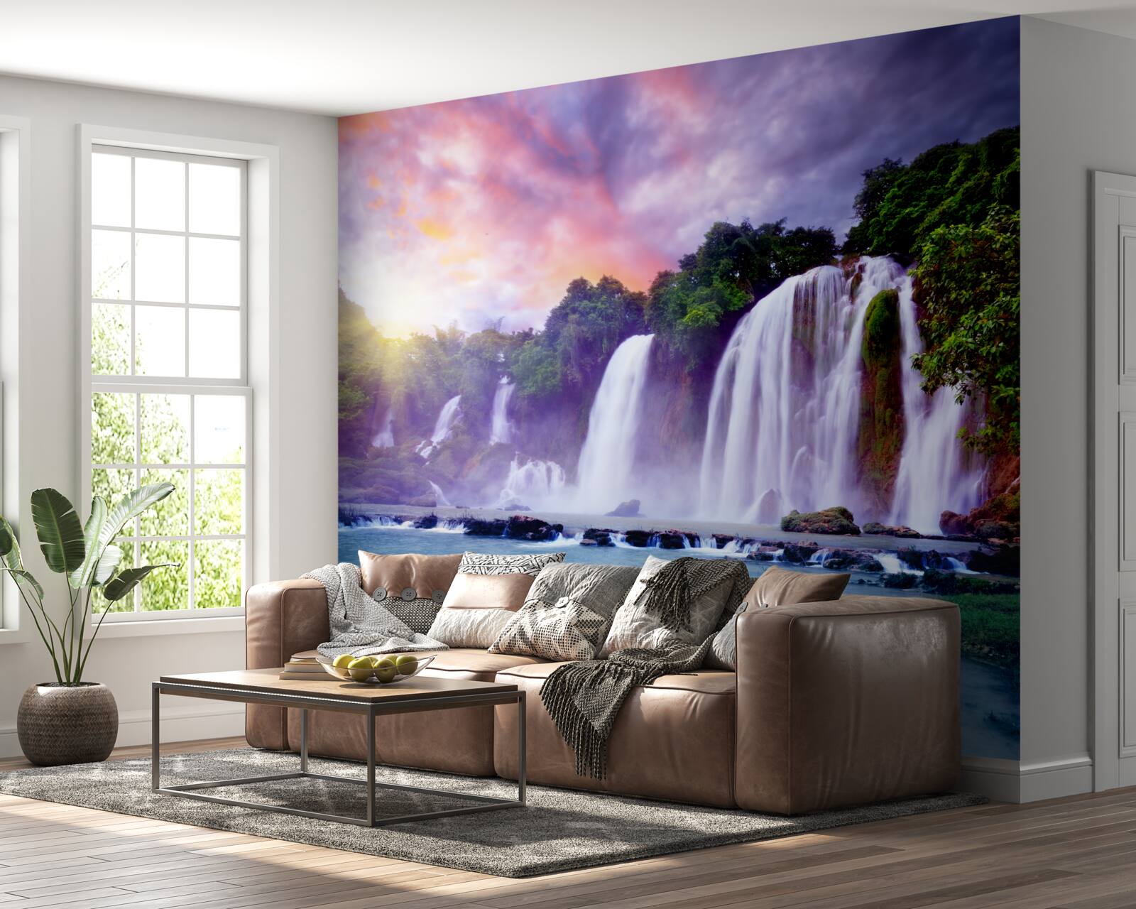 Fotobehang een enorme waterval op een achtergrond van een zonsondergang