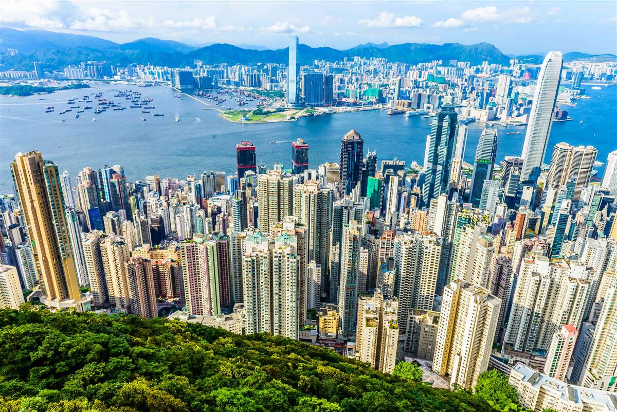 Fotobehang Wolkenkrabbers in Shanghai op een zomerse dag