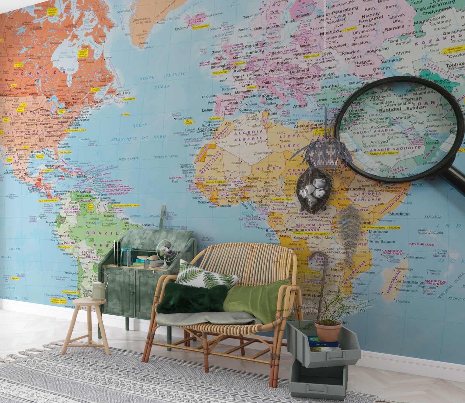 Fotobehang vergrootglas op een gekleurde wereldkaart