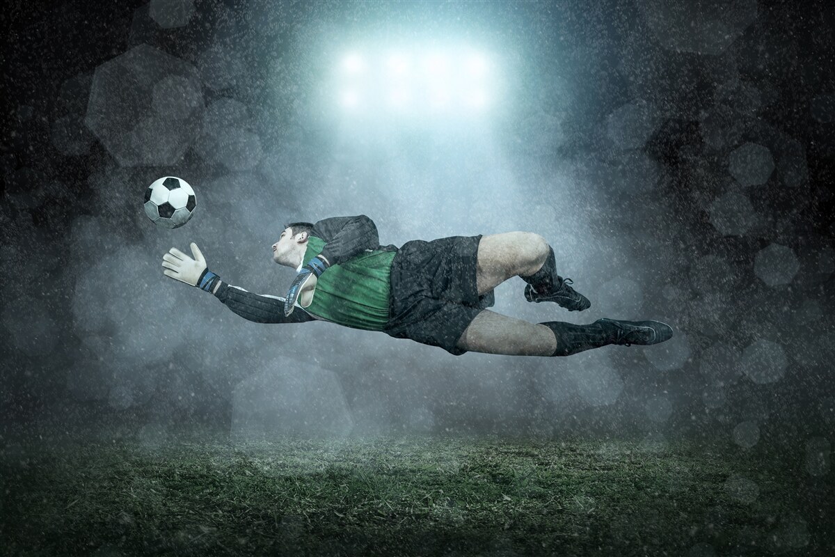 Fotobehang keeper onderschept bal tijdens vlucht