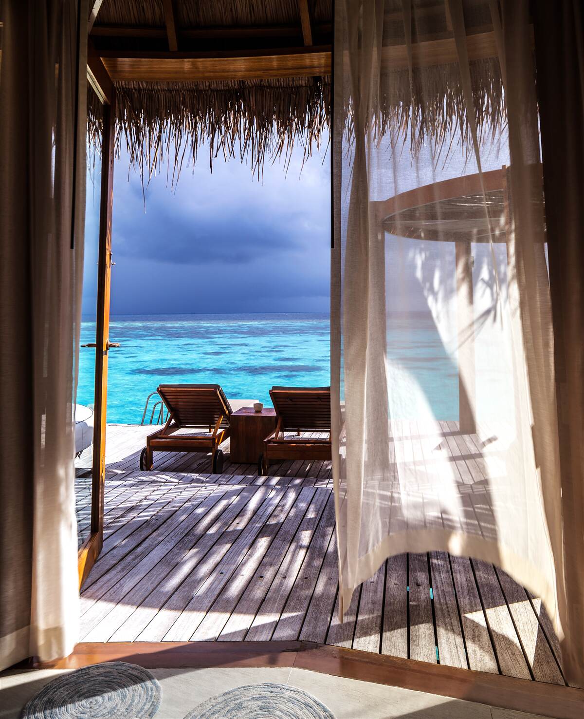 Fotobehang balkon met uitzicht op de oceaan
