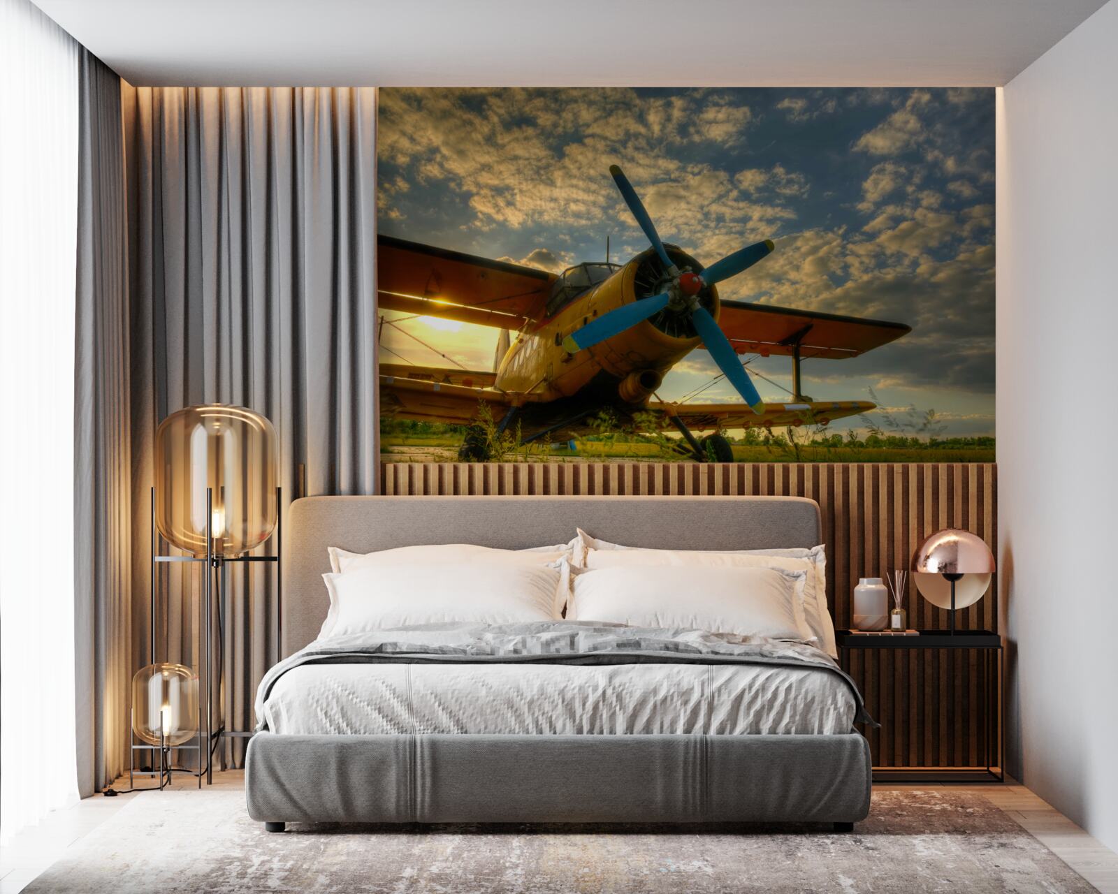 Fotobehang in het veld staat een vintage vliegtuig met een propeller