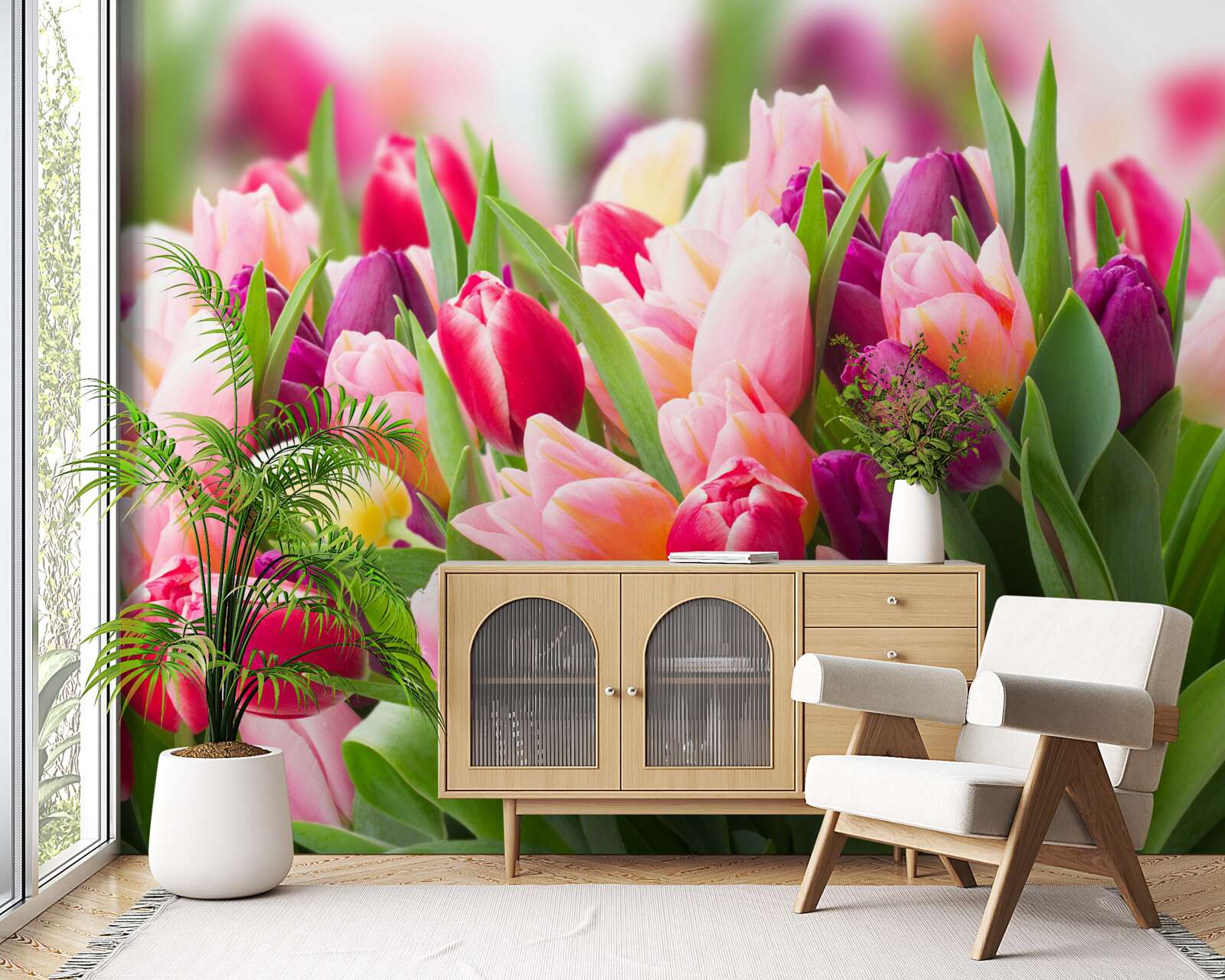 Fotobehang heldere lentetulpen met groene bladeren