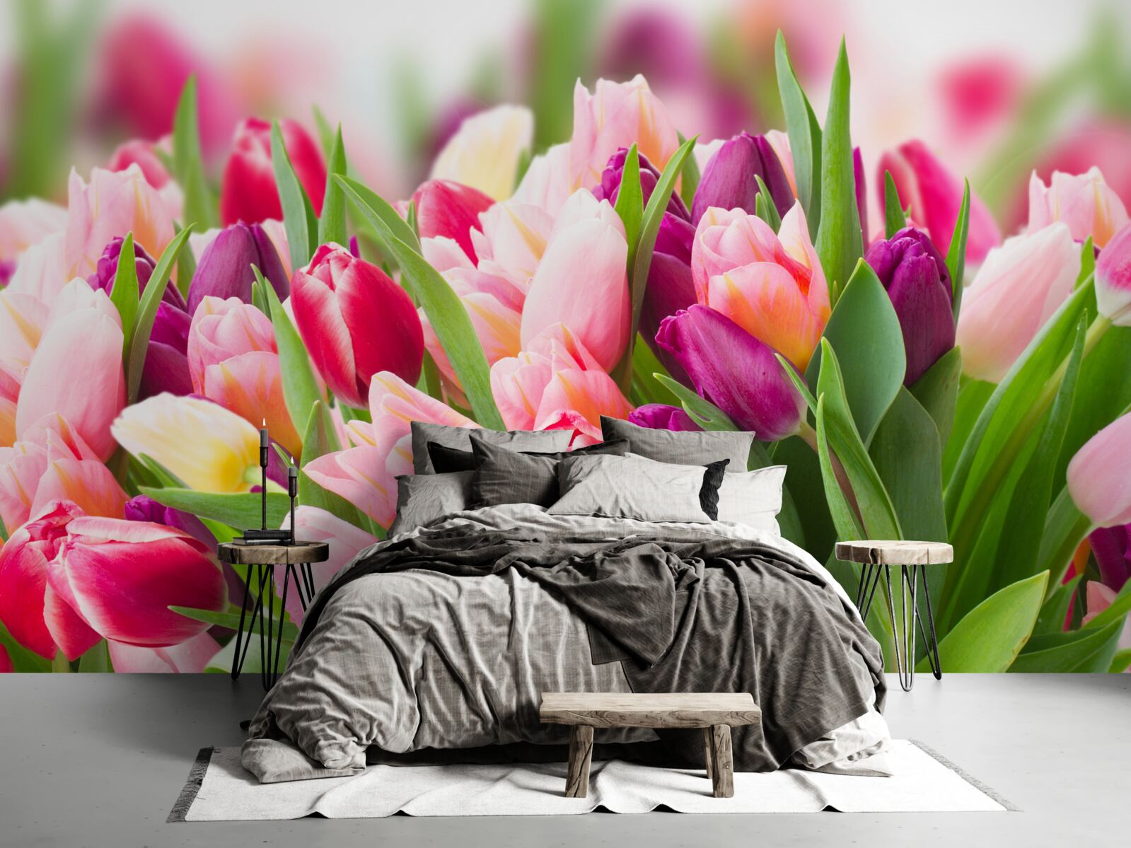 Fotobehang heldere lentetulpen met groene bladeren