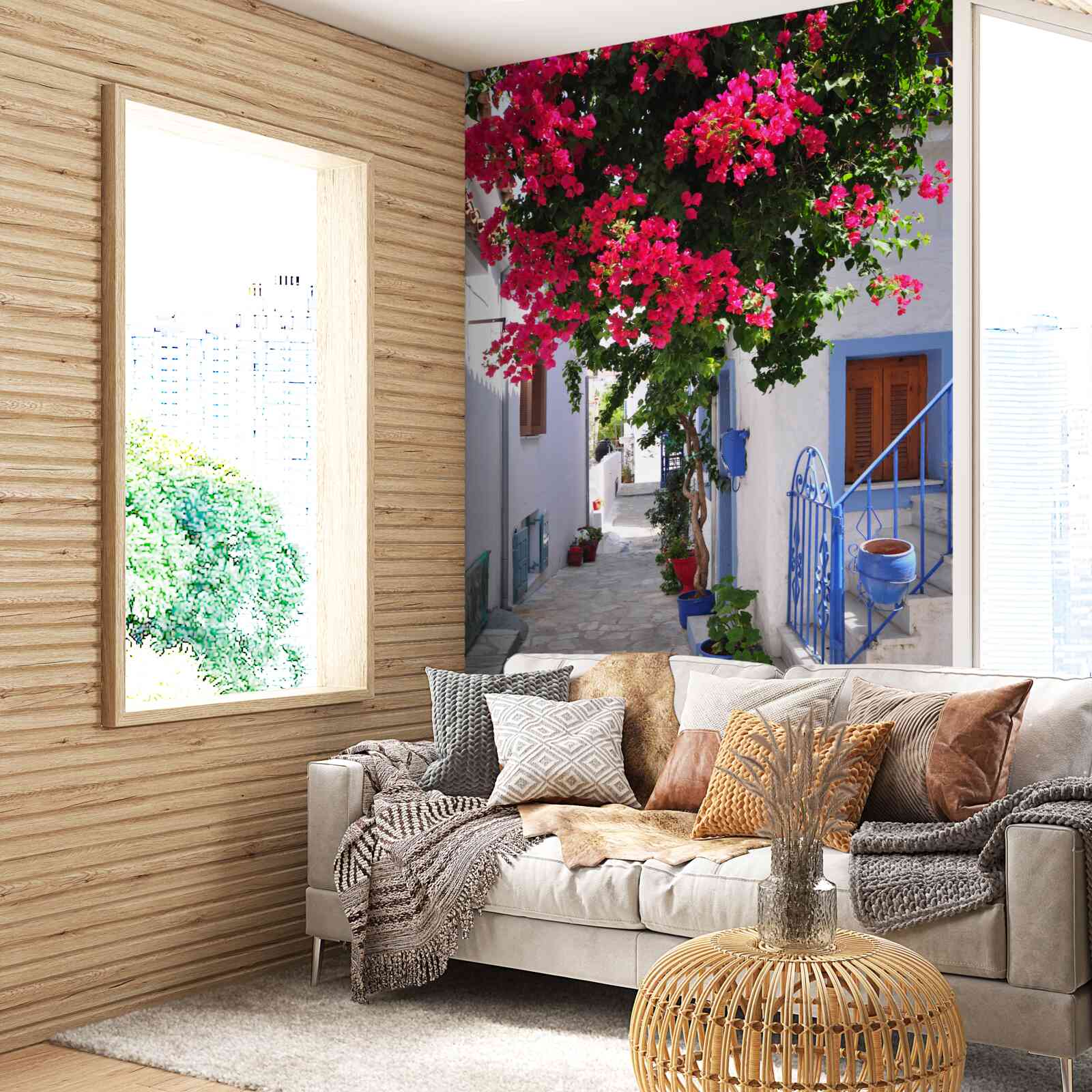 Fotobehang in griekenland groeien rode bloemen bij witte huizen