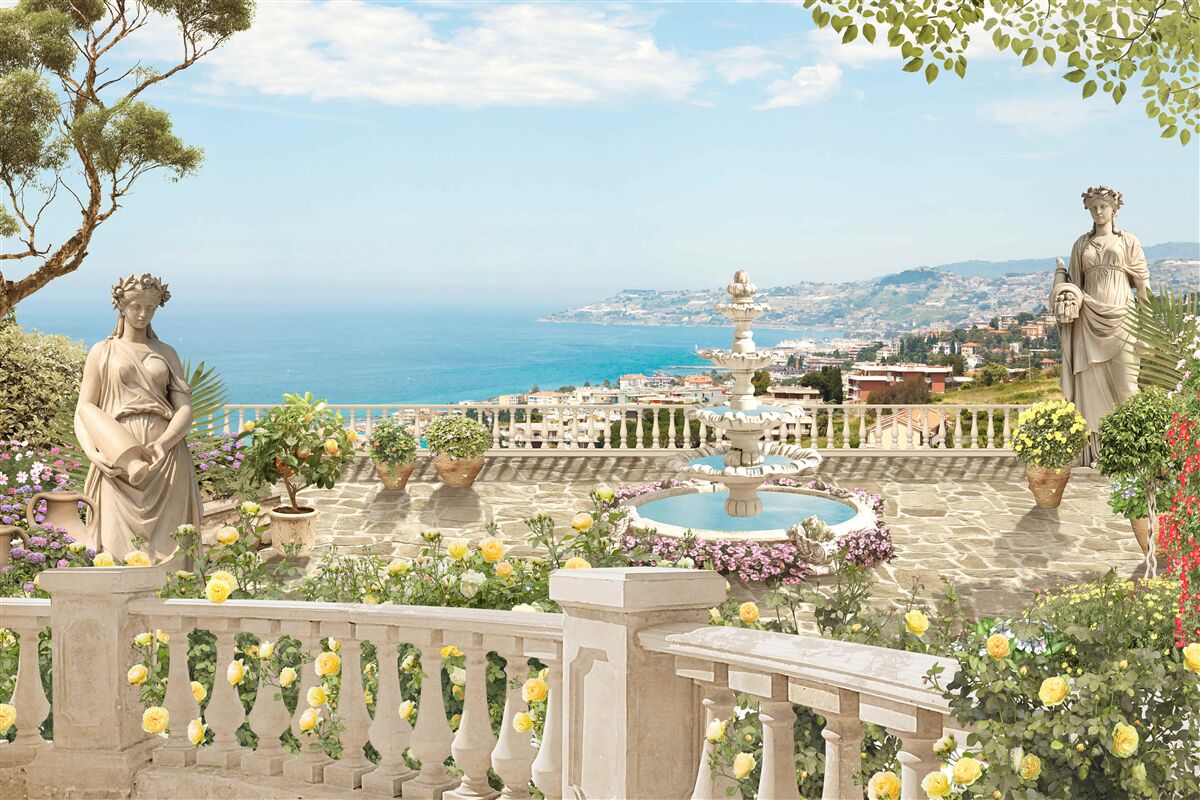 Fotobehang stenen uitkijkterras met fontein en oceaanzicht