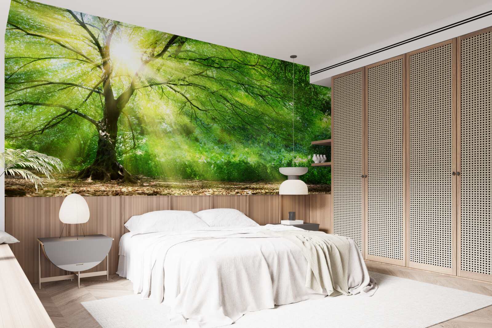 Fotobehang lichte zonnestralen breken door de weelderige boomkruinen