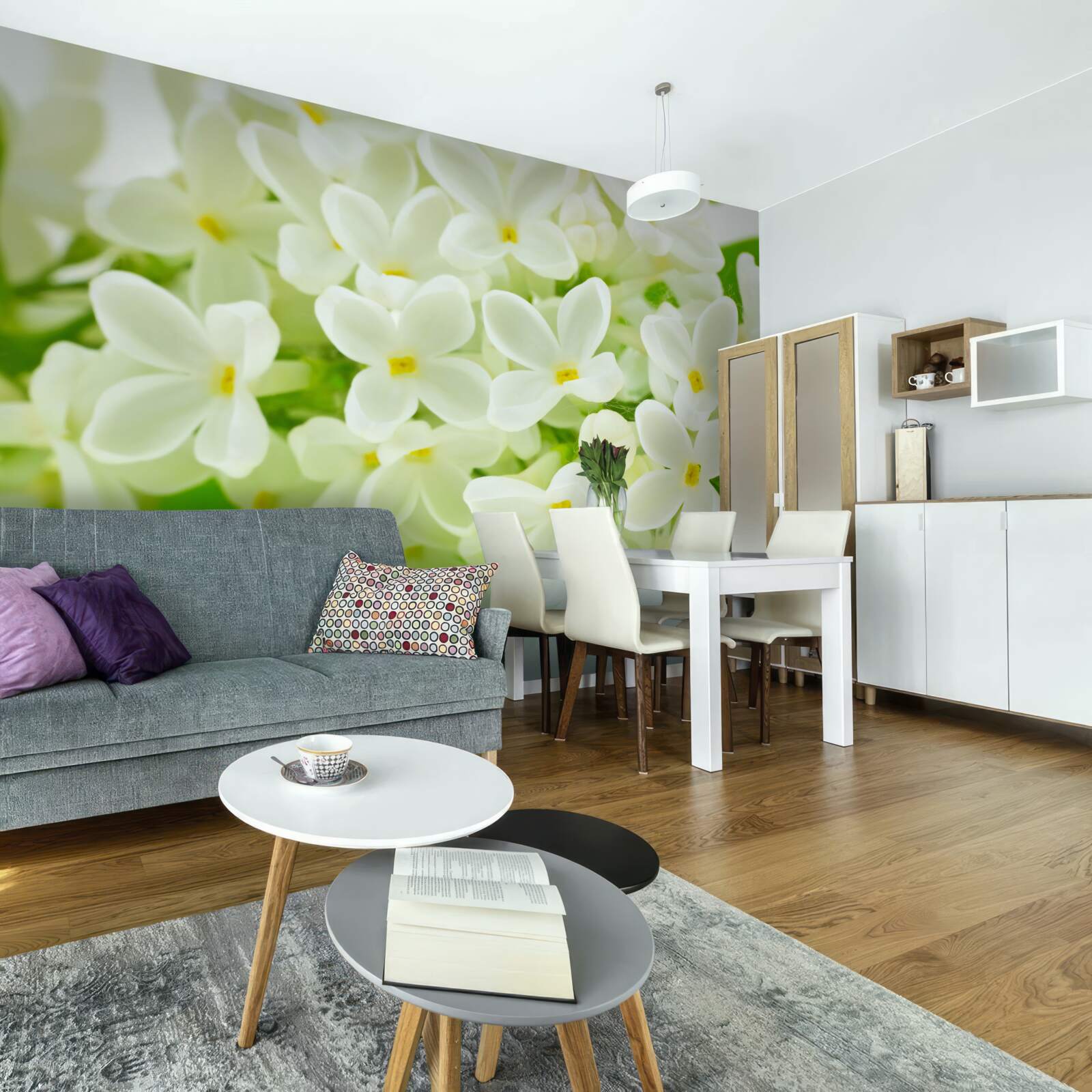 Fotobehang sneeuwwitte bloemen die de boom overvloedig bedekken