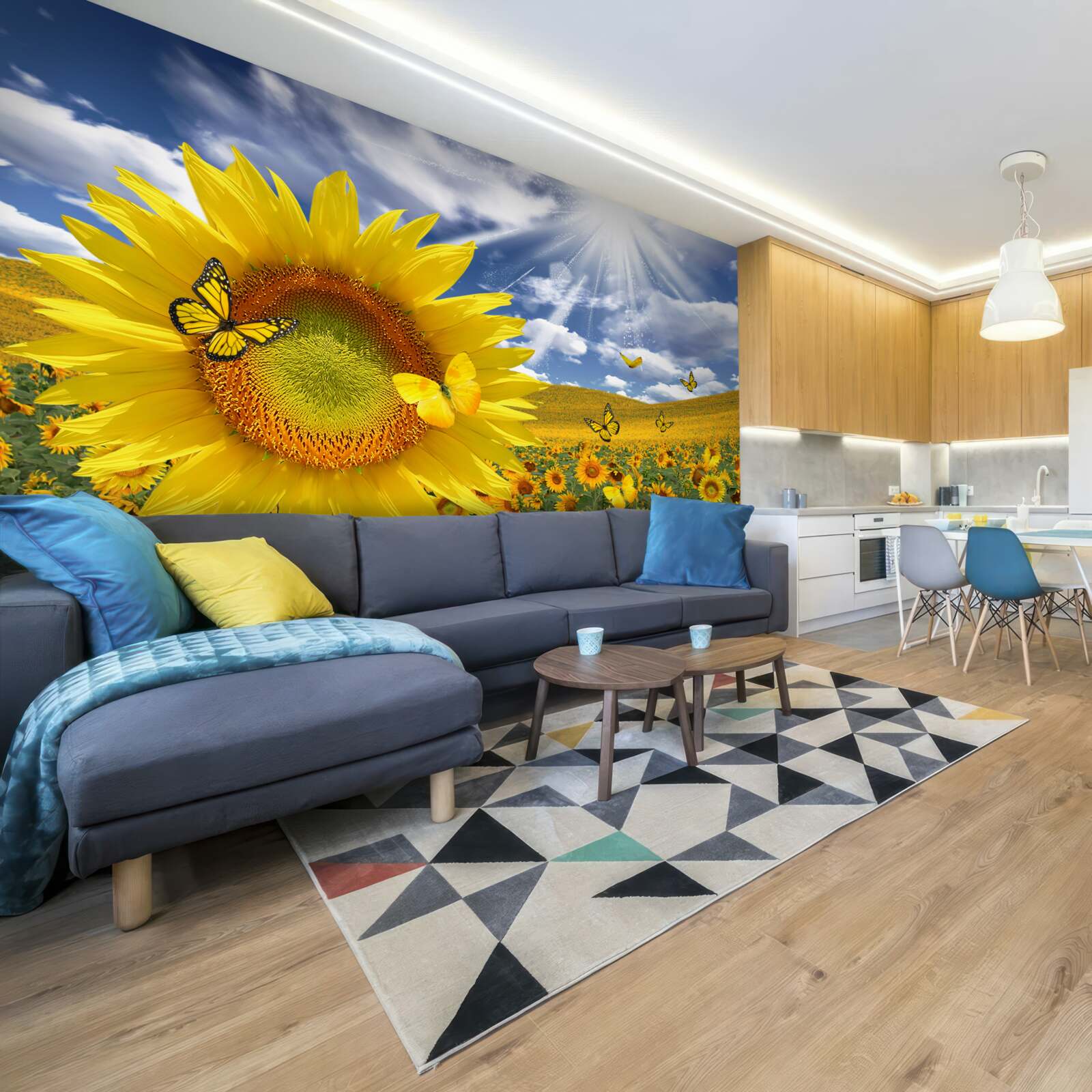 Fotobehang gouden vlinders zweven in de blauwe lucht boven een veld zonnebloemen