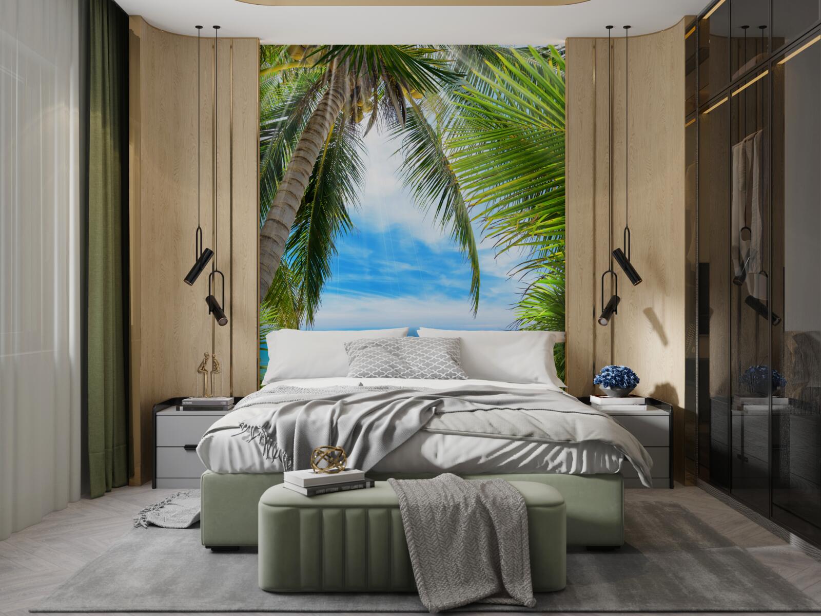 Fotobehang pad naar de oceaan door de palmbomen