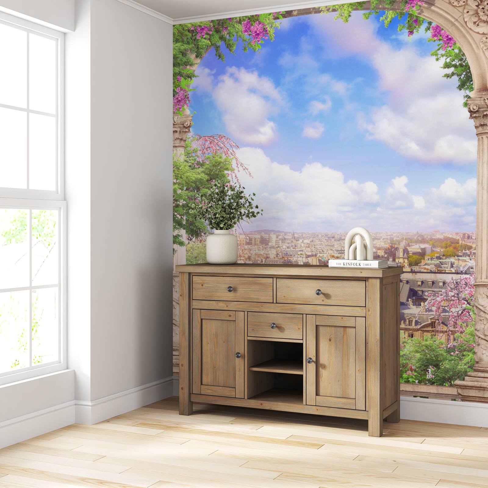 Fotobehang panorama van de stad vanaf een bloeiend balkon