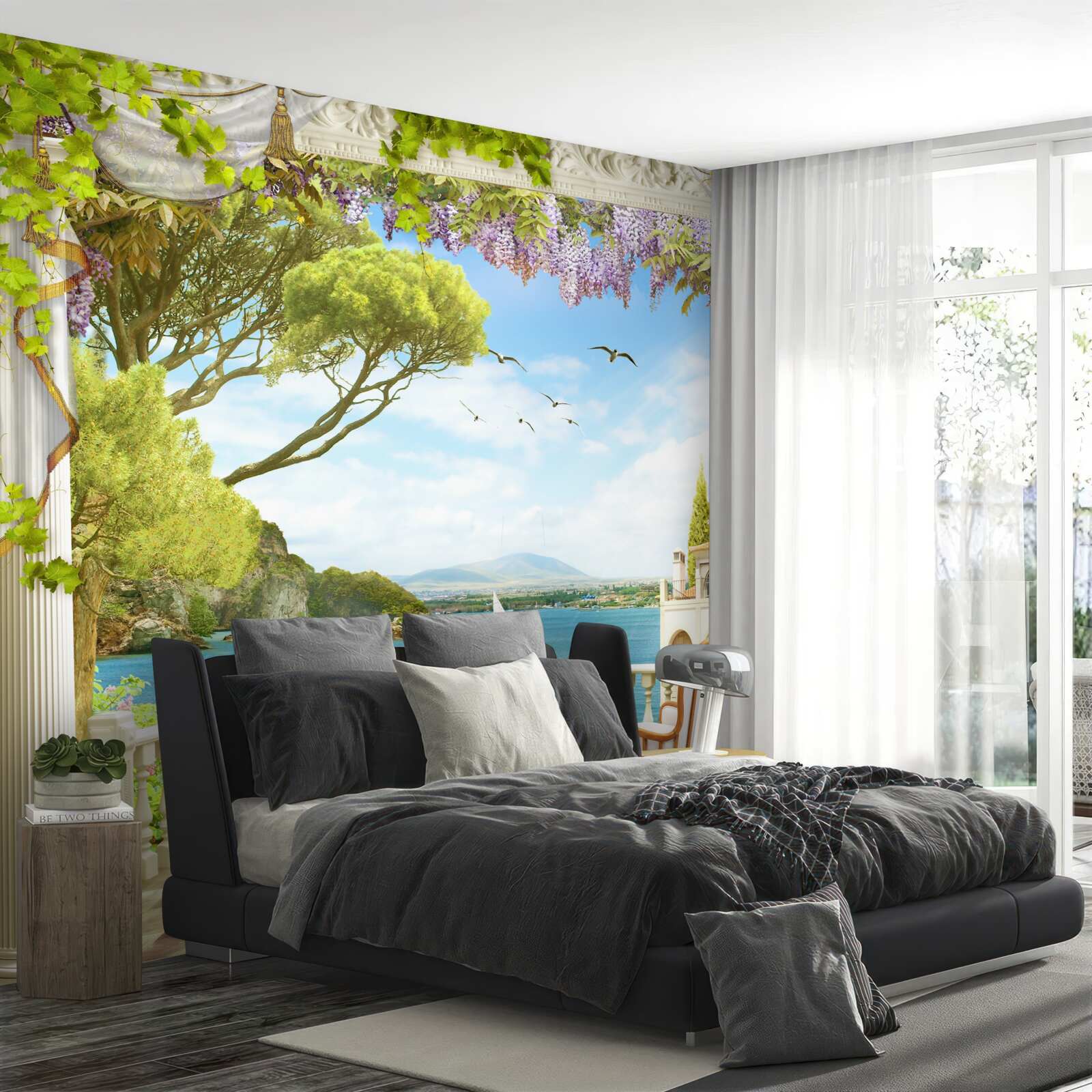 Fotobehang een paar stoelen met een tafel en uitzicht op de oceaan