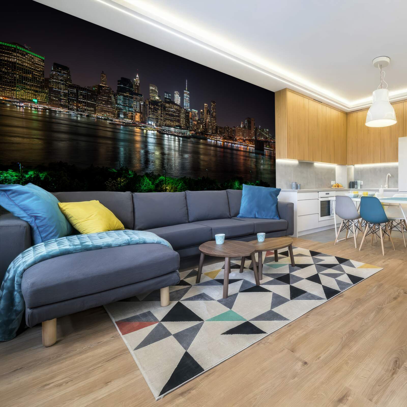 Fotobehang panorama van de nachtelijke stad vanaf de andere oever